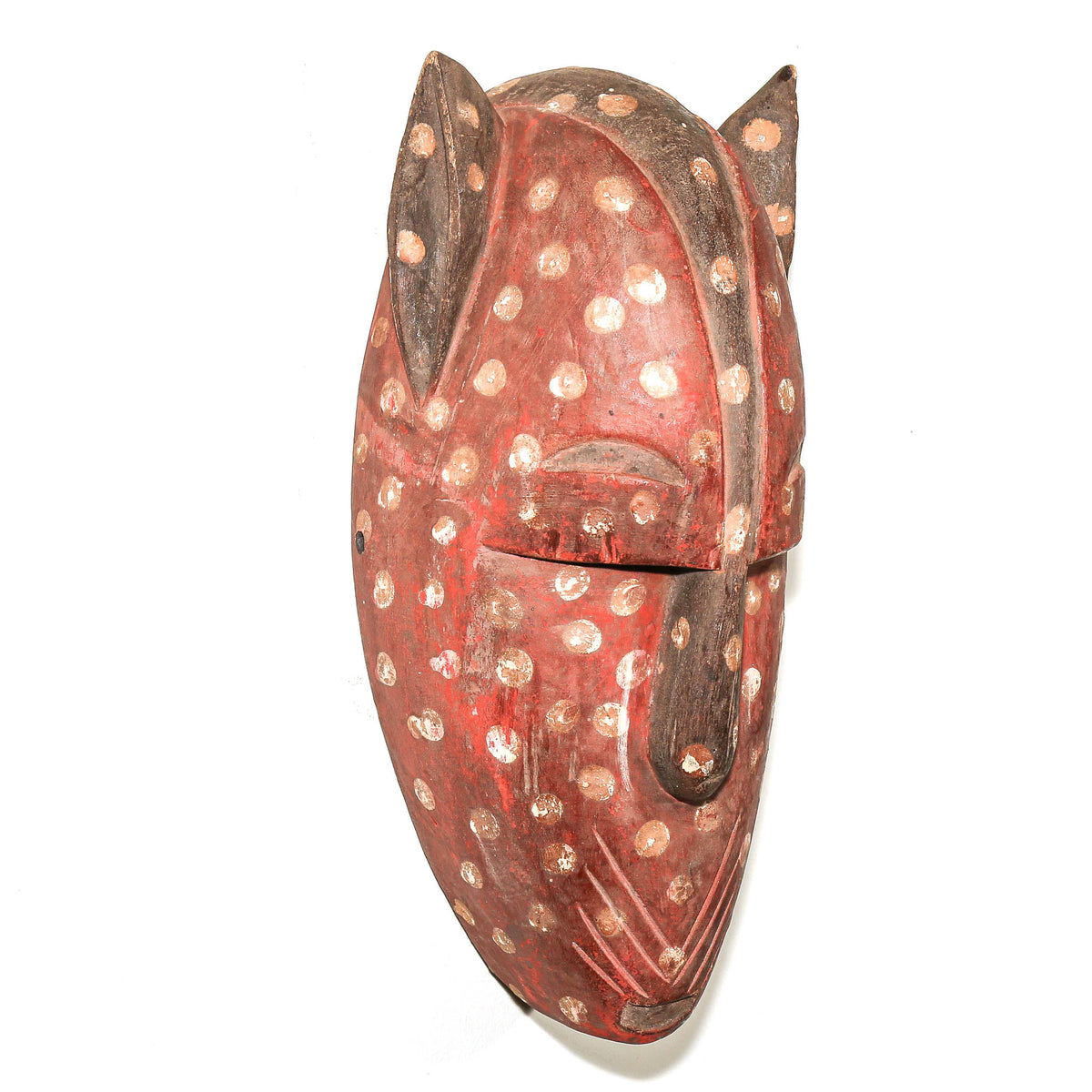 Traditional Bamana animal mask from Mali with carved cat features and bold sculptural details characteristic of West African art