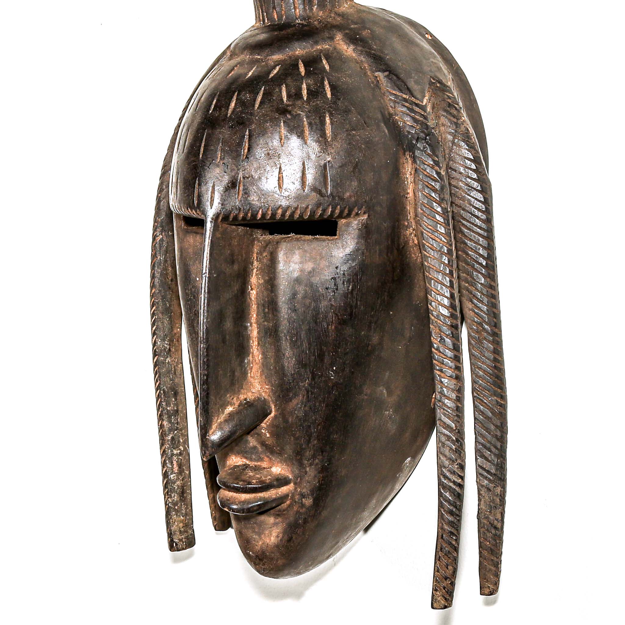 finely carved wooden modern african wall mask. Home and living room decor to hang on the wall