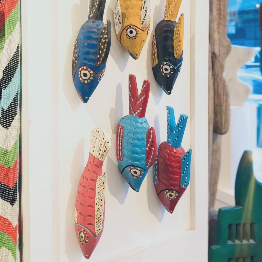 Bozo Fish Sculpture hung on a wall