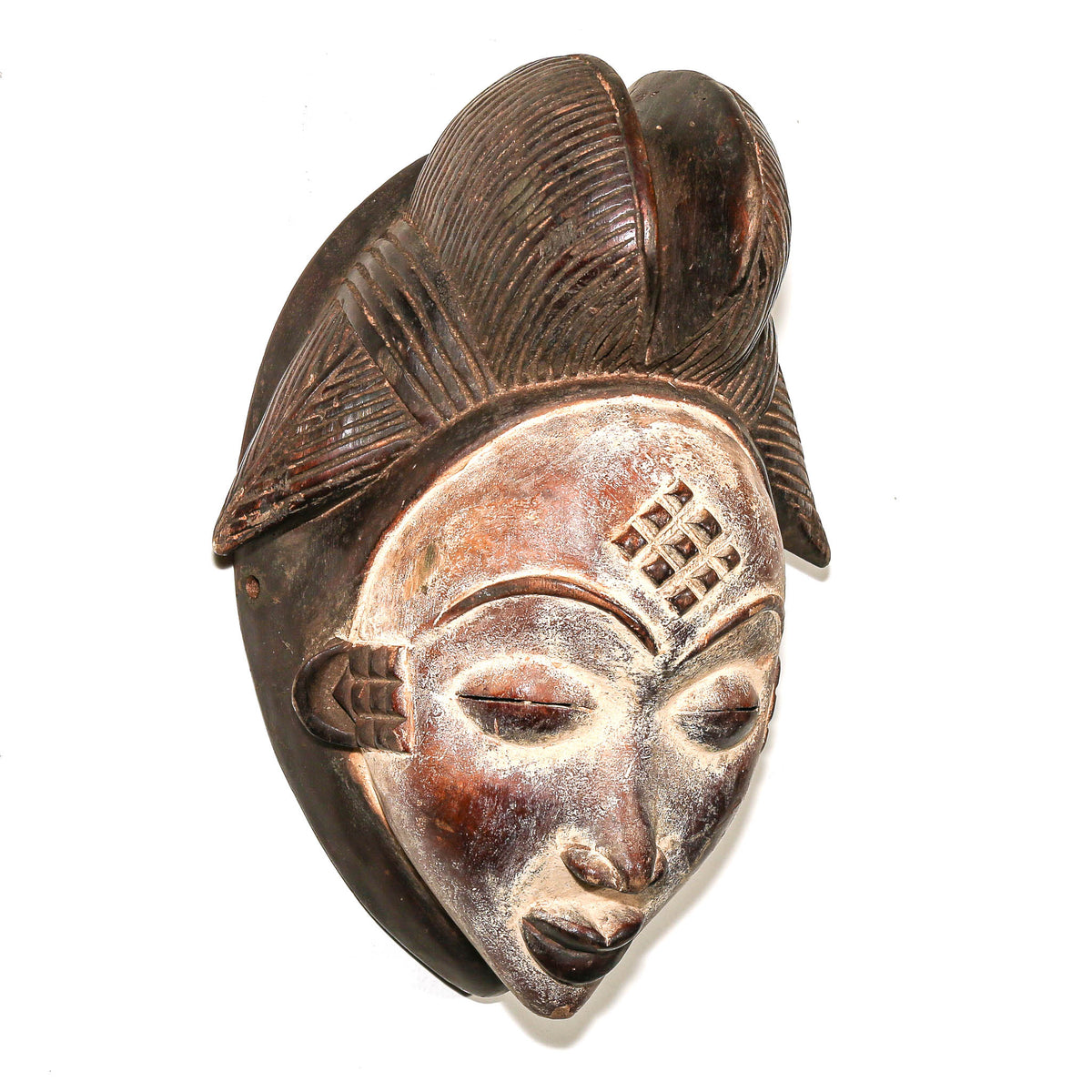 Elegant large Punu mask from Gabon featuring smooth facial contours, balanced proportions, and classic regional design