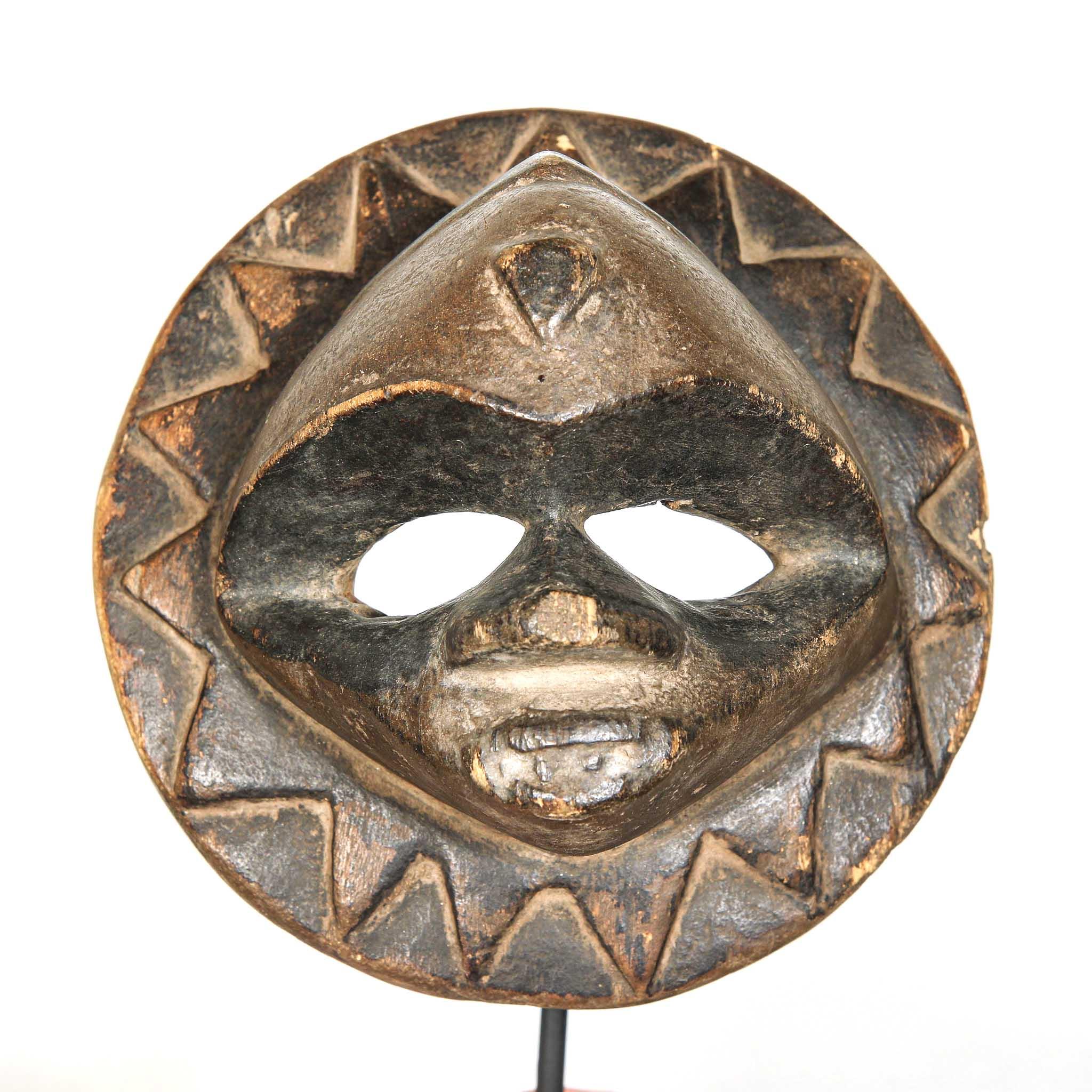 Eket Mask, Cameroon small authentic African mask on a close up