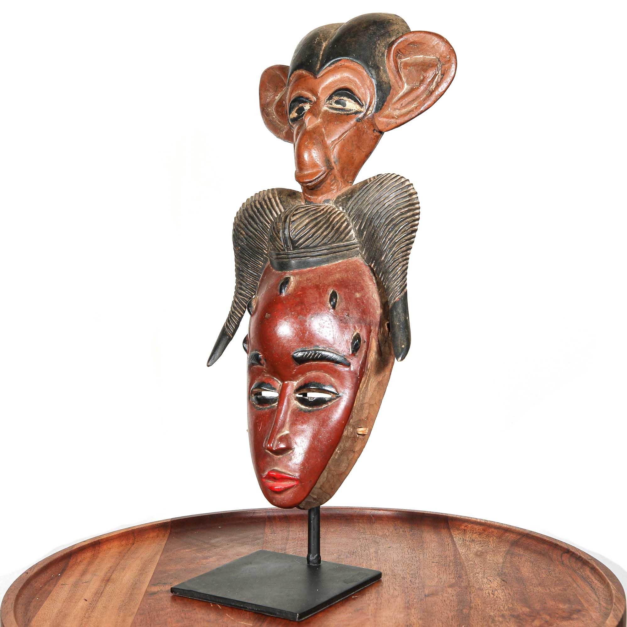 Guru Mask with Primate from Côte d'Ivoire on a stand