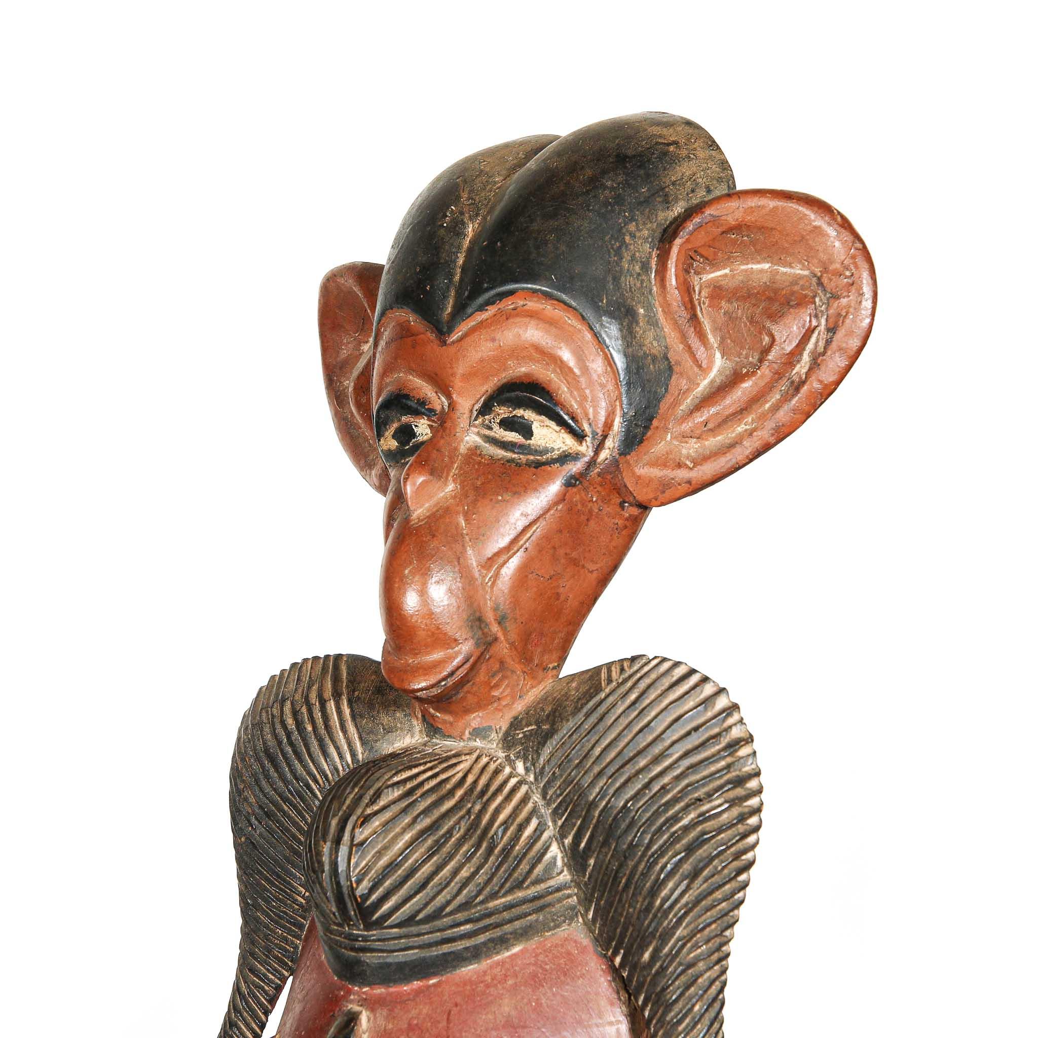Guru Mask with Primate from Côte d'Ivoire showing primate from the left