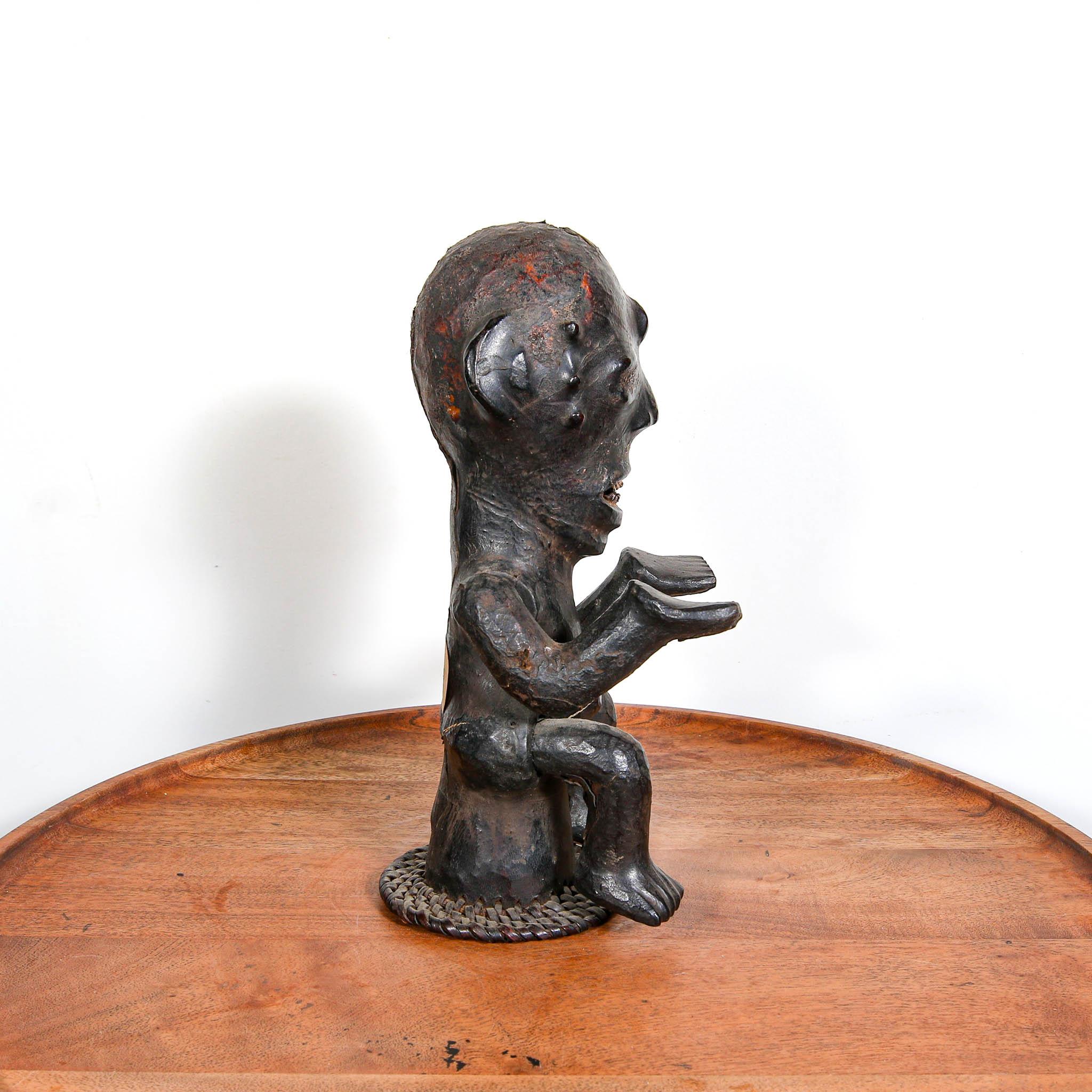 Ekoi Headdress, Nigeria an authentic ceremonial art from Africa on a table showing right side