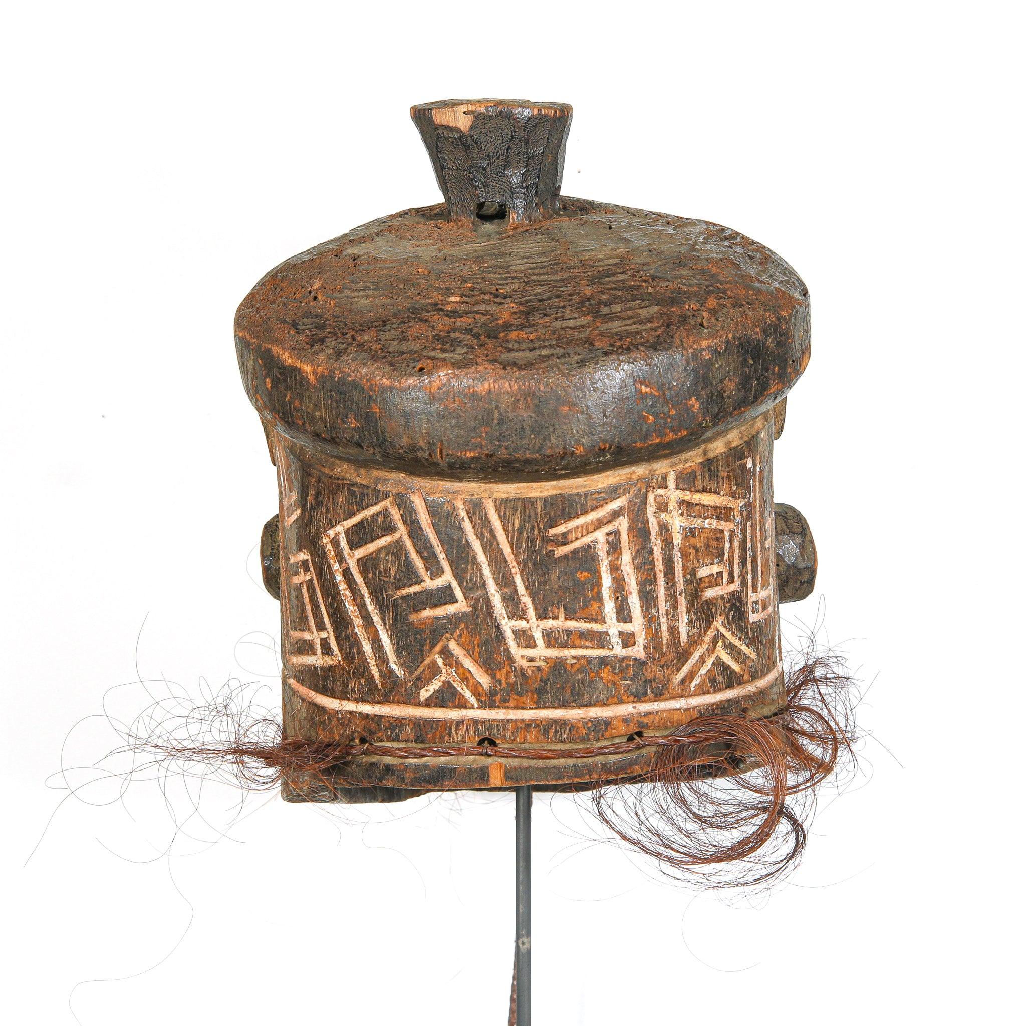 Kuba Binji Helmet Mask from D.R. Congo on a stand showing back side