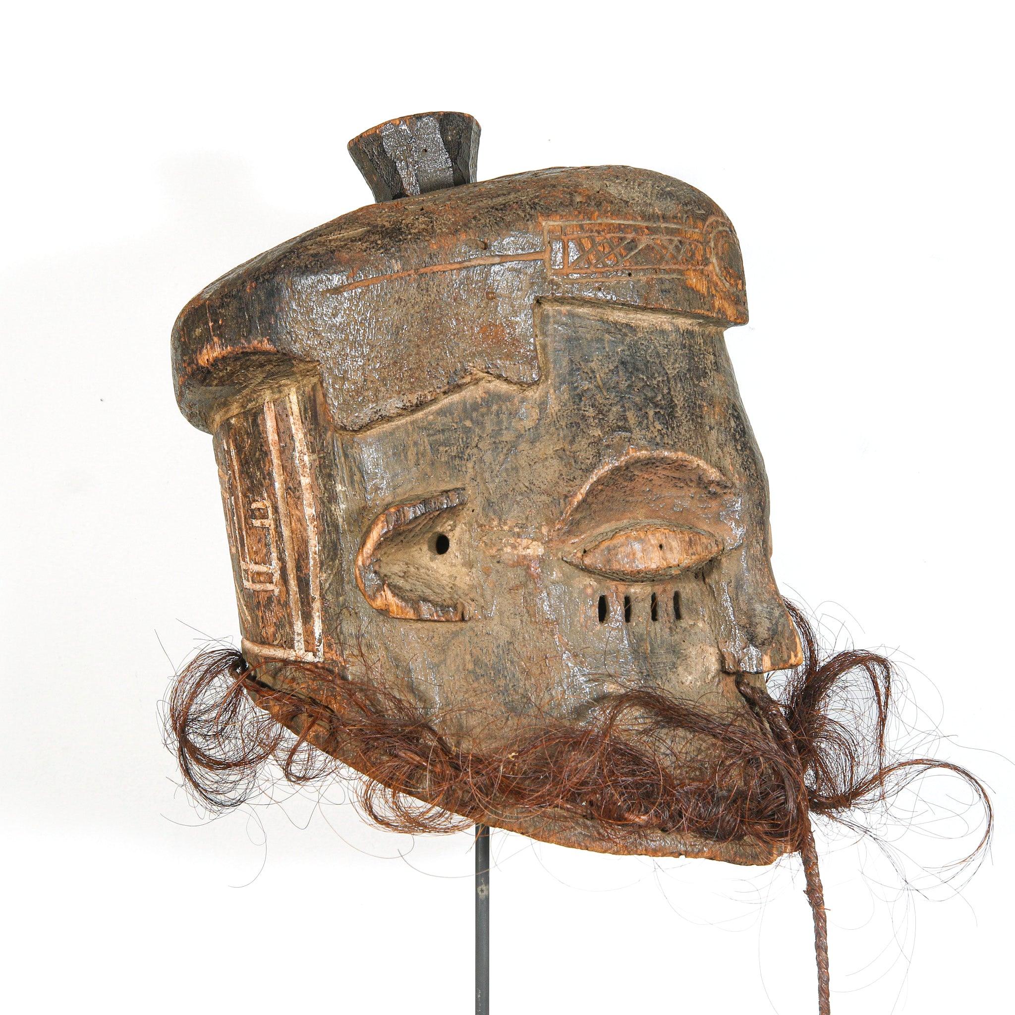 Kuba Binji Helmet Mask from D.R. Congo on a stand showing right side