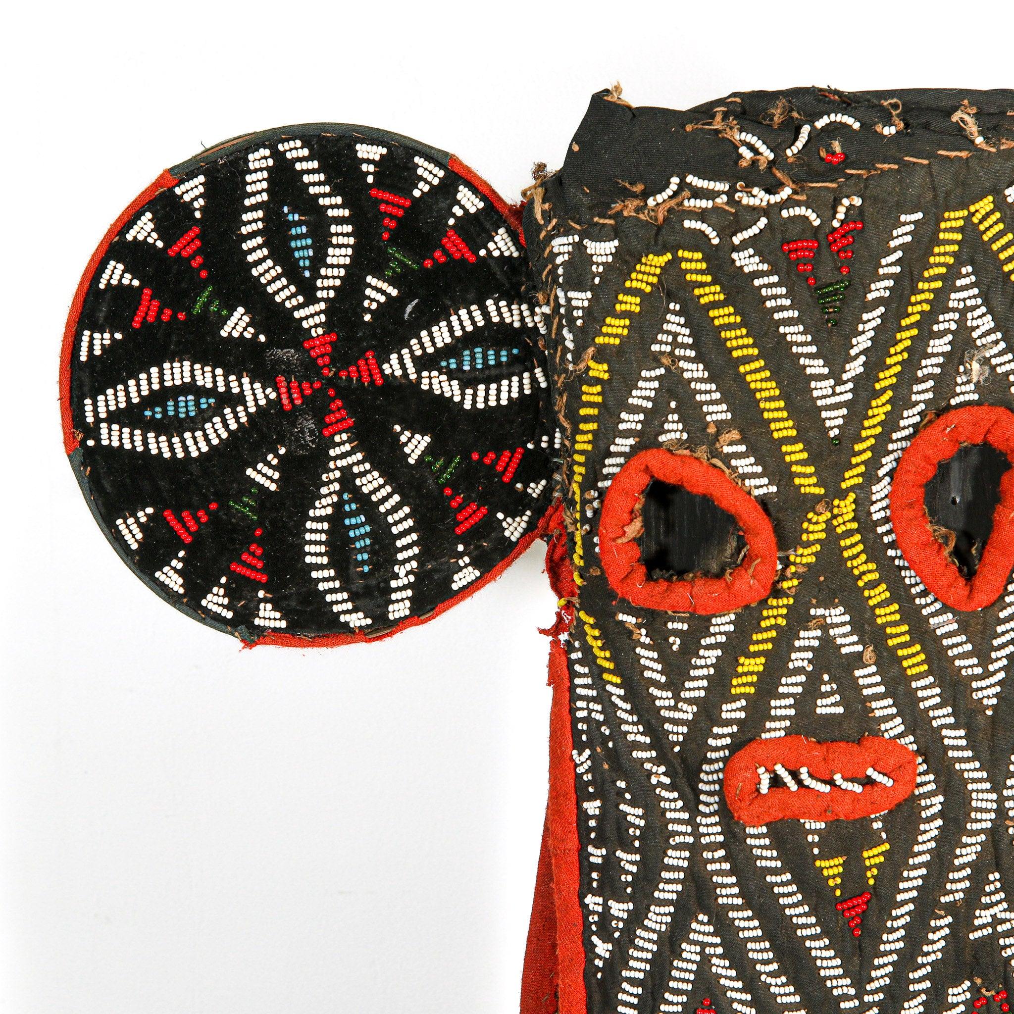 Bamileke Beaded Elephant Kuosi Mask from Cameroon on a stand with a close up