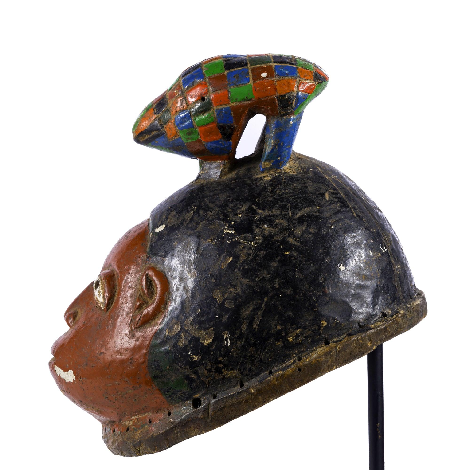 Yoruba Gelede Mask from Nigeria on a stand showing left side