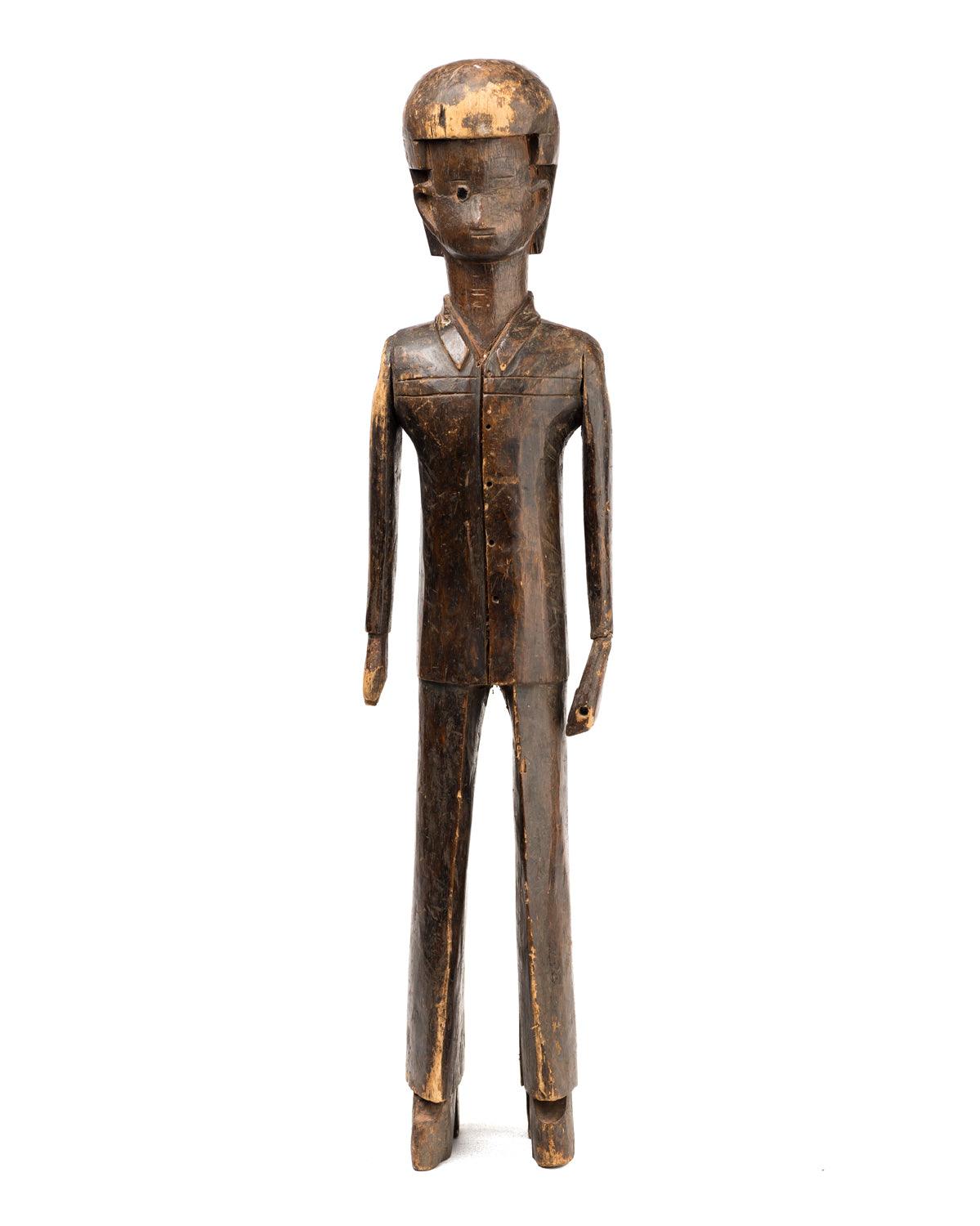 Antique wood African sculpture that looks like Elvis