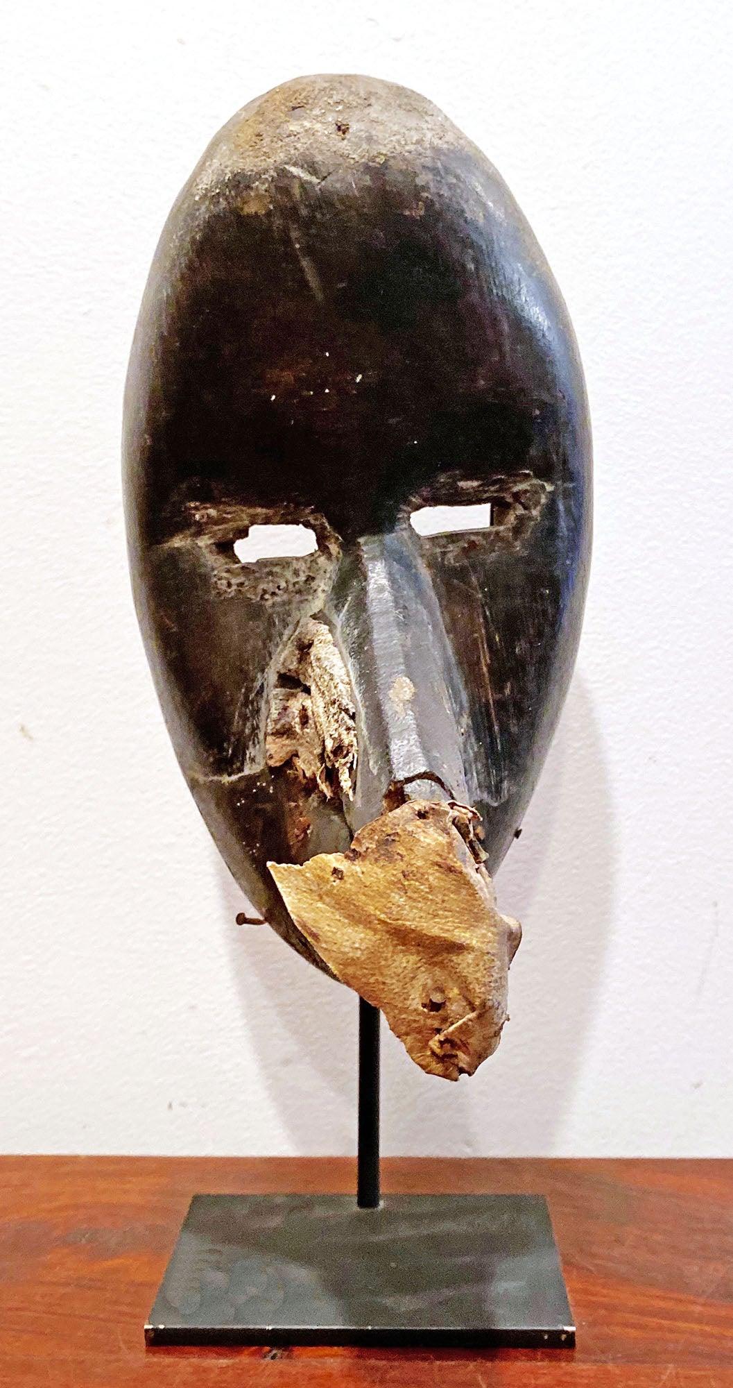 Dan Bird Mano Mask, Liberia/ Ivory Coast as a traditional African art front