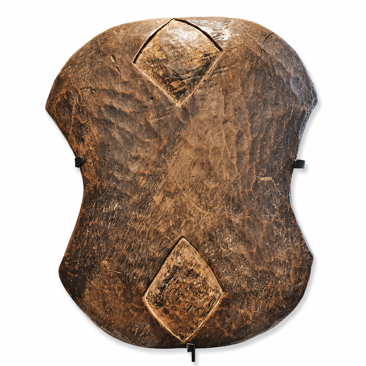 Brown wooden shield with diamond patterns on a white background