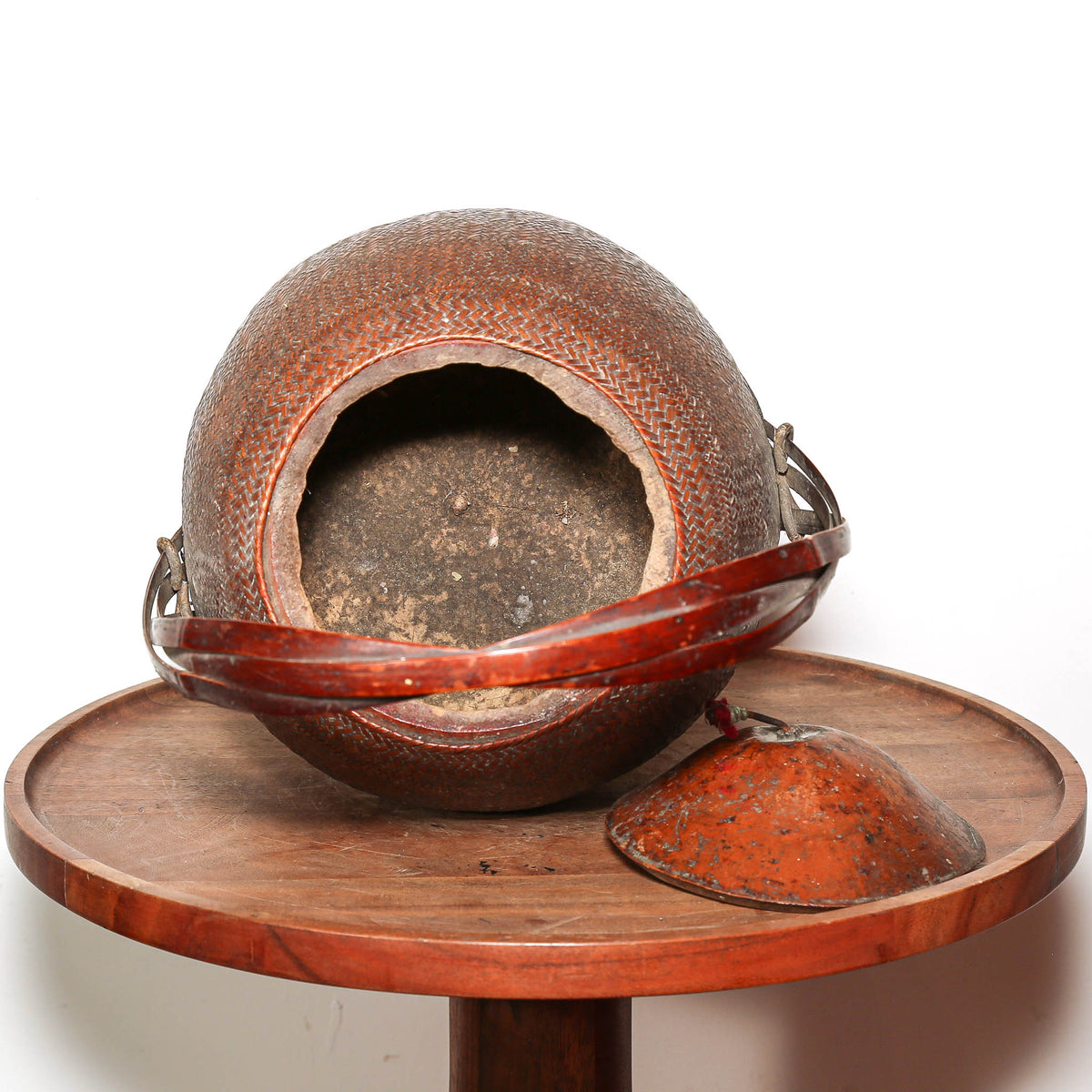 Antique African basket with gourd lid, woven fiber surface and sculptural handle
