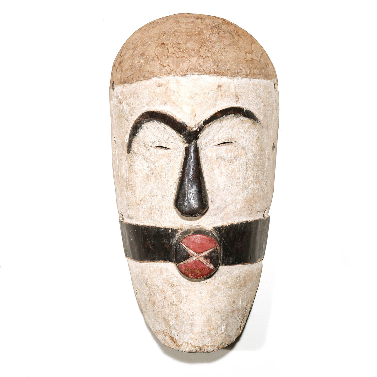 black and white African mask in the modern Songye style to hang on the bedroom wall for protection