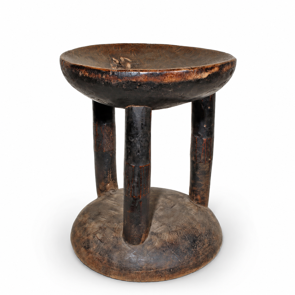 Vintage rare African wooden stool with a round top and three legs on a white background