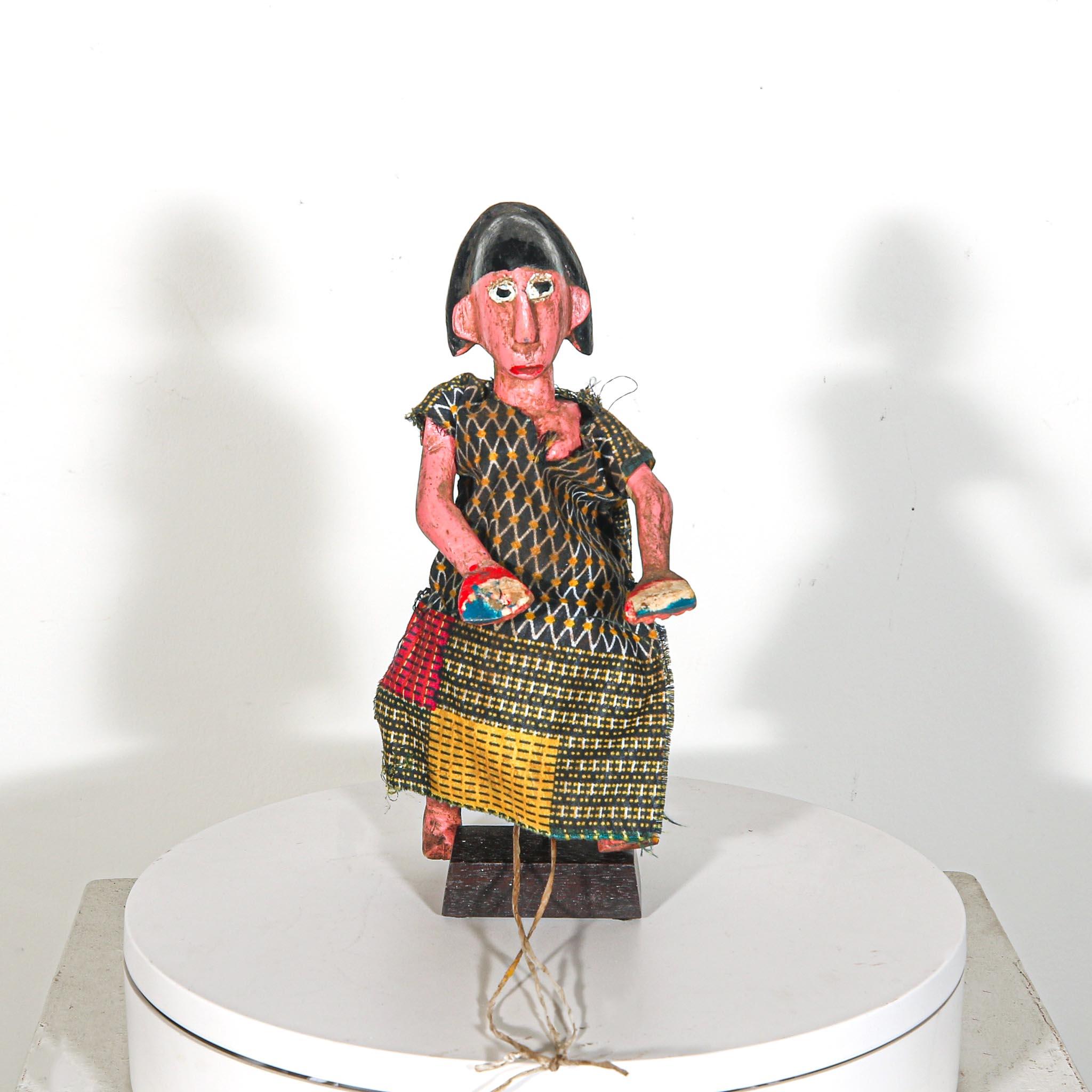 Puppet Doll from Mali standing on a disply