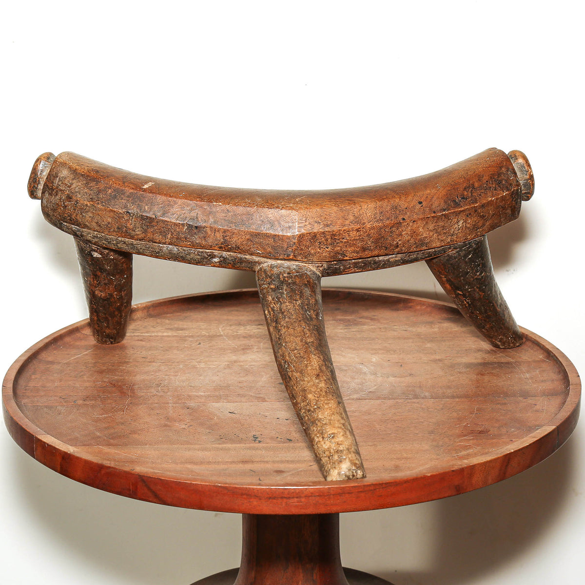 African tribal art Dinka headrest carved from wood with elegant minimalist shape and aged surface