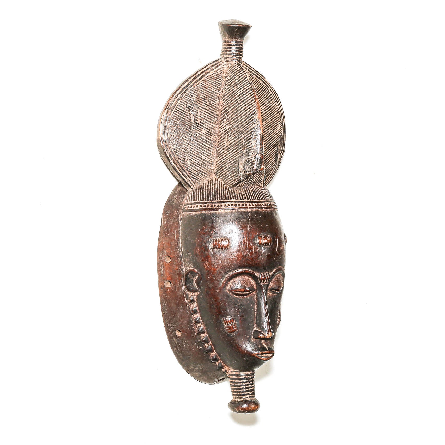 Baule Kpan mask with elaborate carved hairstyle