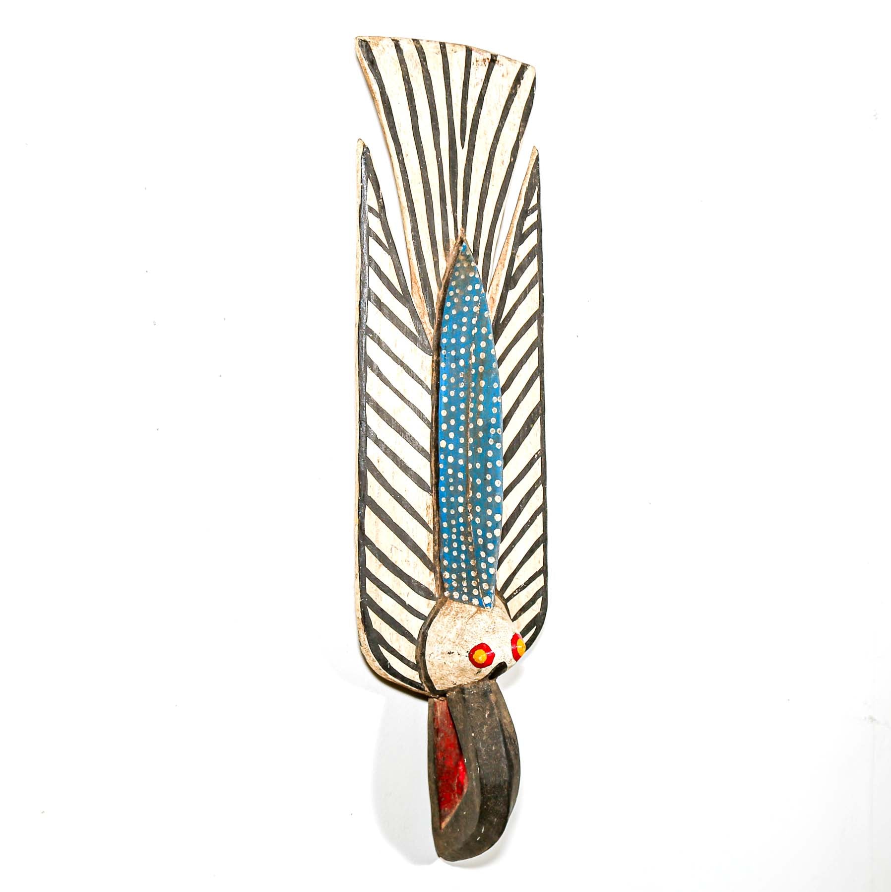 Decorative wall art piece with feather design on a white background