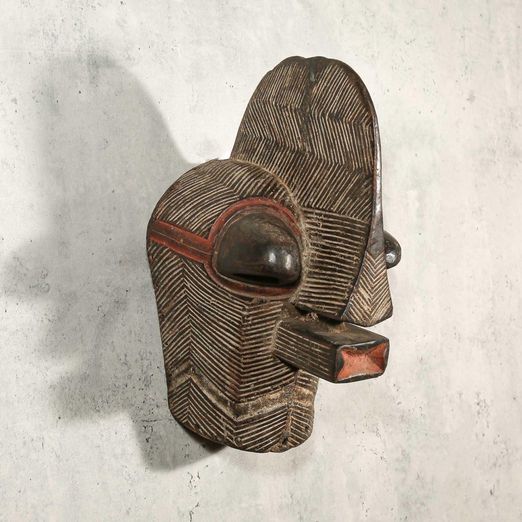 Songye Mask from D.R. Congo as an African mask wall decor idea