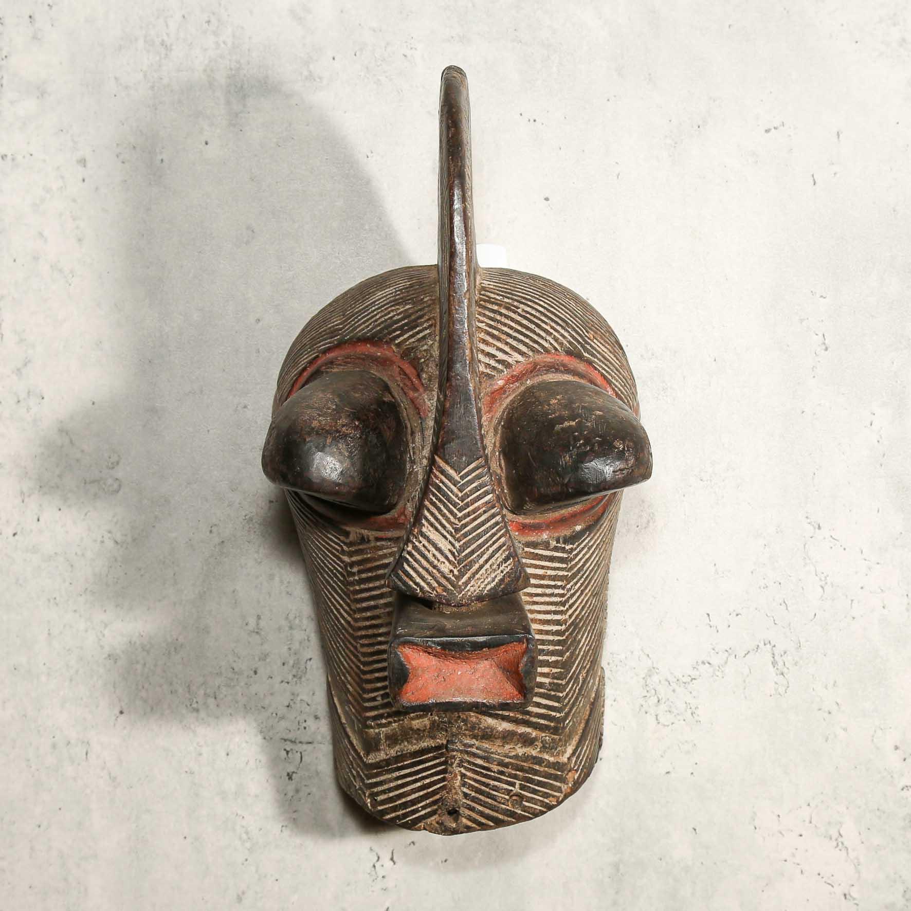 Songye Mask from D.R. Congo as an African mask wall decor idea up front