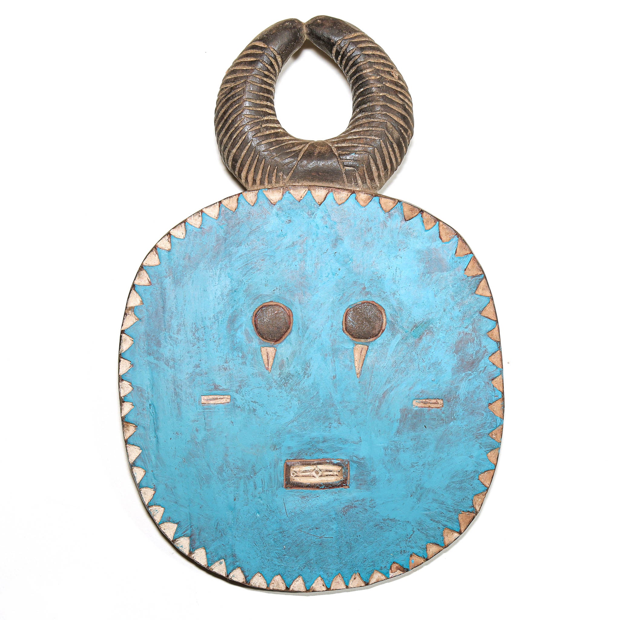 A traditional African wooden and turquoise mask with a curved, horn-like top piece, featuring a bright turquoise blue face with hand-painted details and a natural wood border.