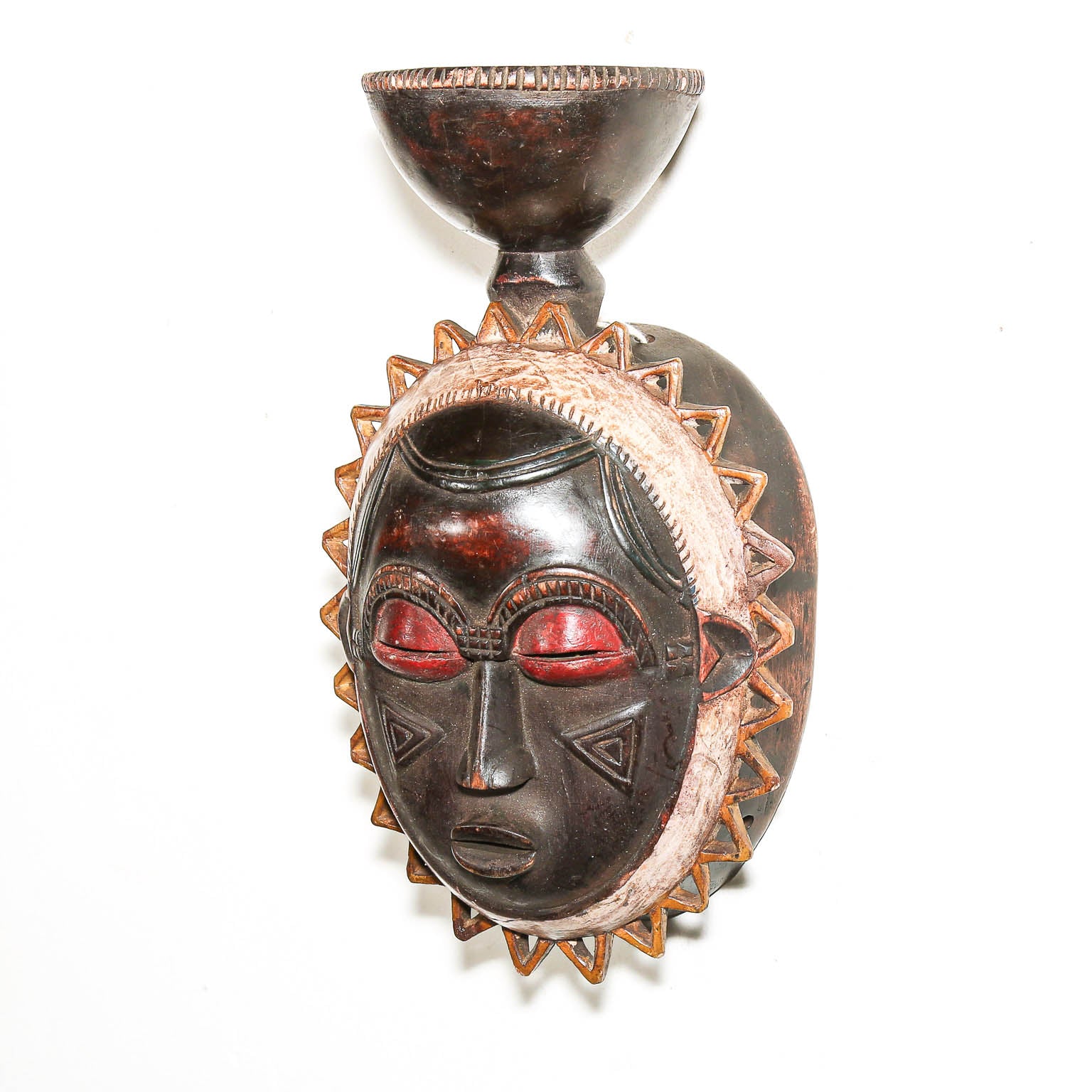 Brown African wood mask from Ivory Coast for wall decor
