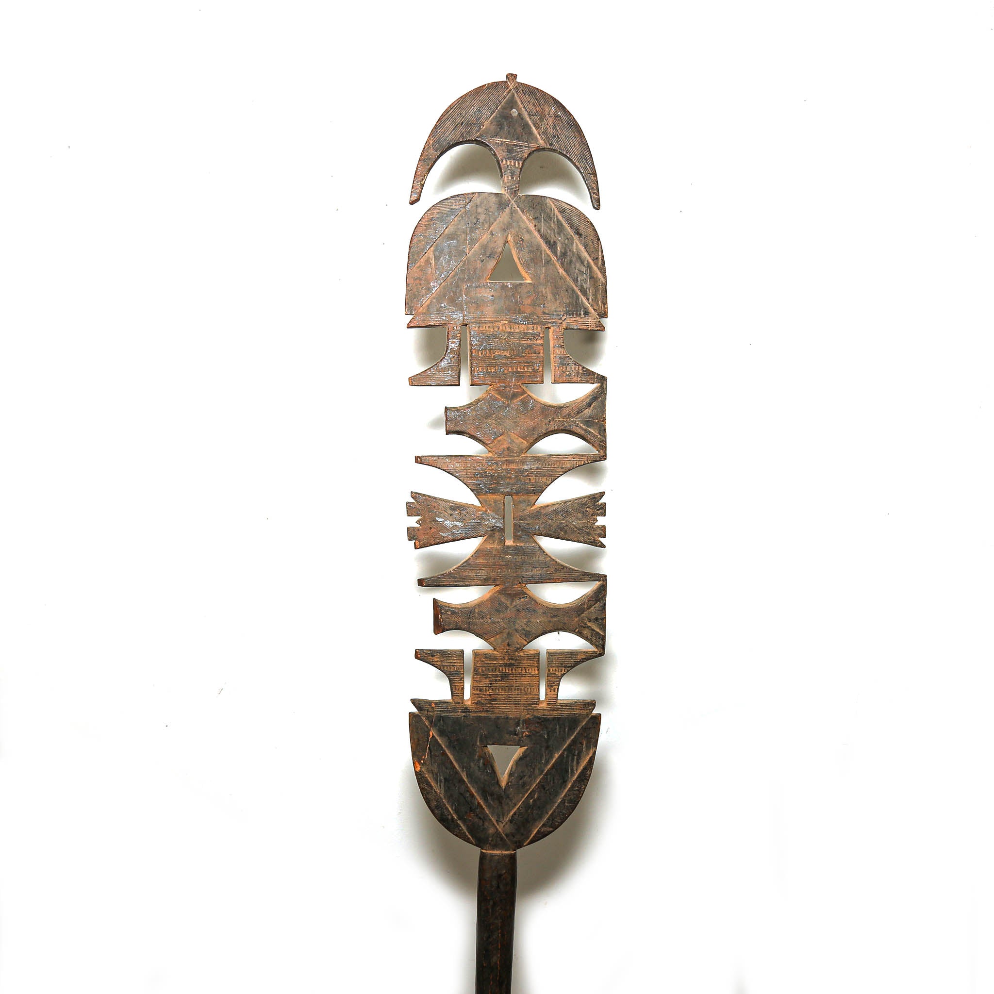 Tall antique Tuareg wooden tent post with carved geometric patterns