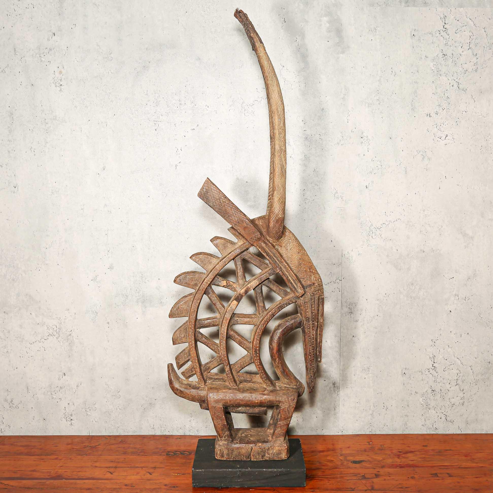 Ci Wara Antelope Headdress from Bamana, Mali standing on a table  showing back