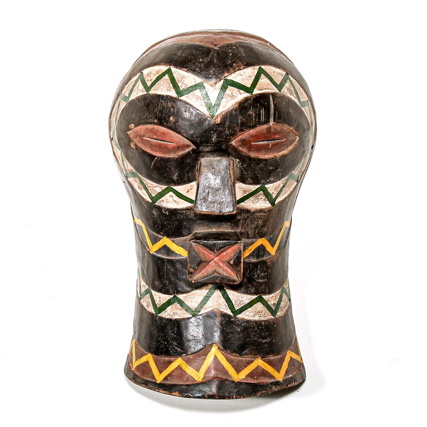 Decorative mask with black, green, and yellow patterns on a white background