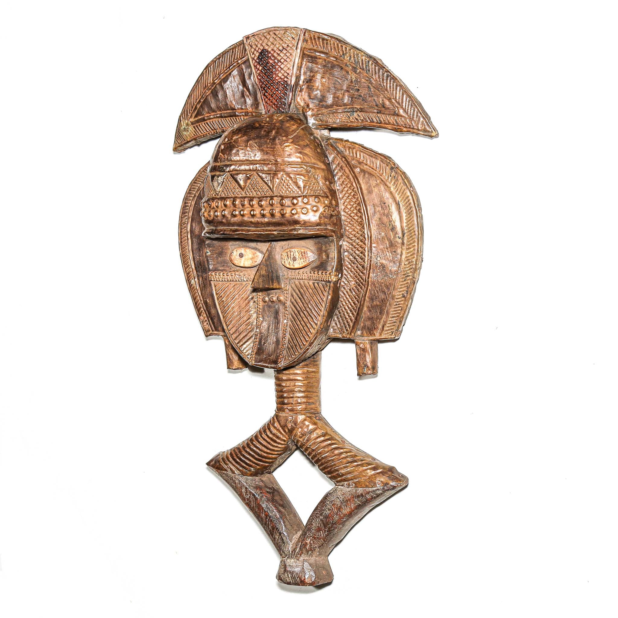 Side view of fine African Kota guardian sculpture from Gabon with metal overlay