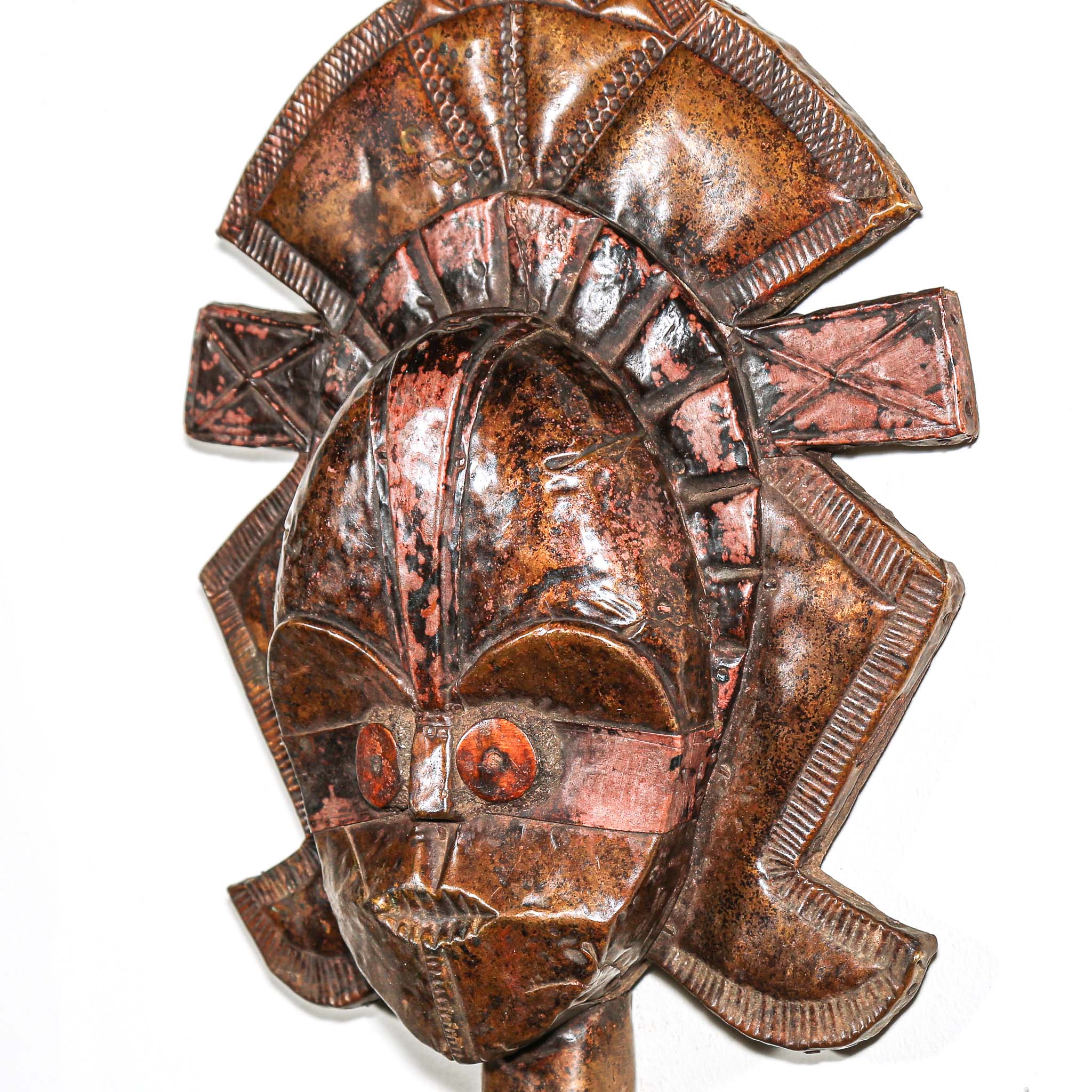 Side view of antique African Kota guardian sculpture from Gabon with metal overlay