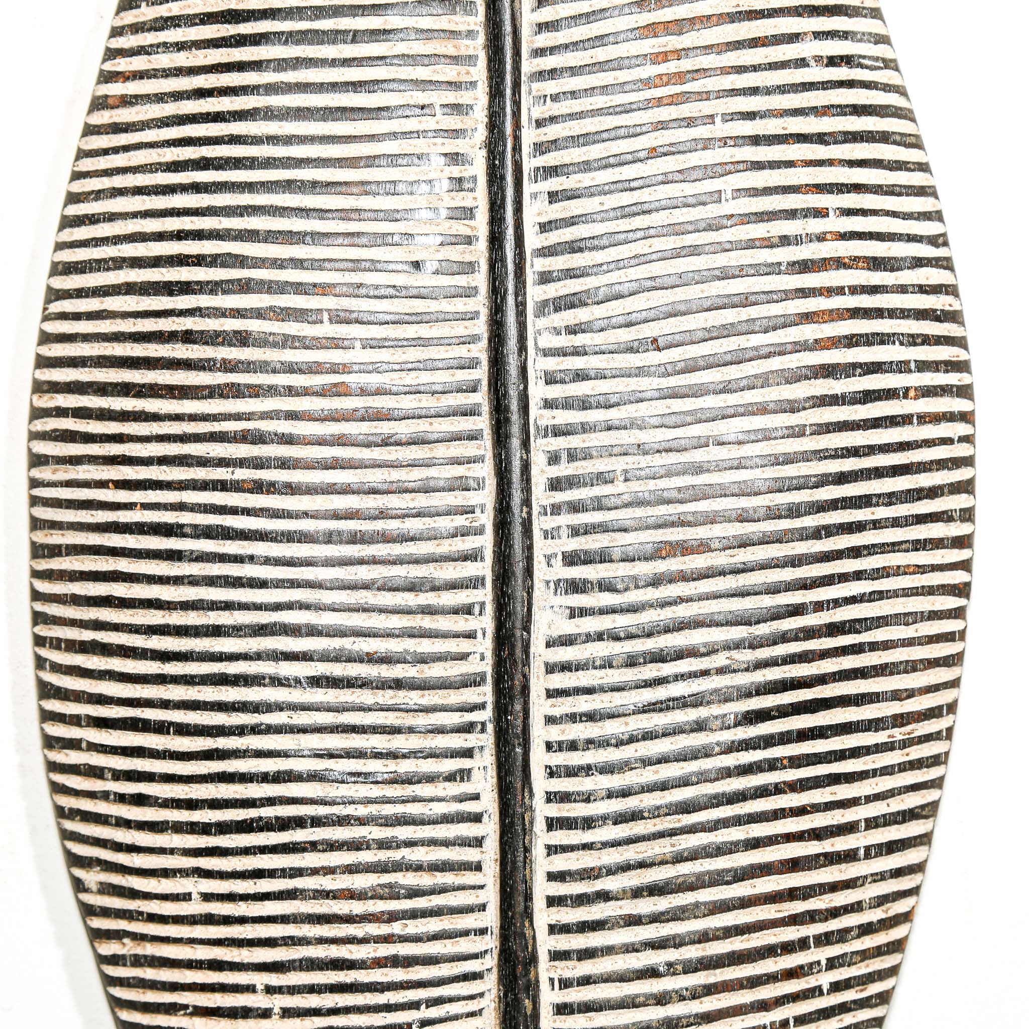 black and white wood African shield to hang on the wall for interior design ideas. Modern and tribal African art for sale.