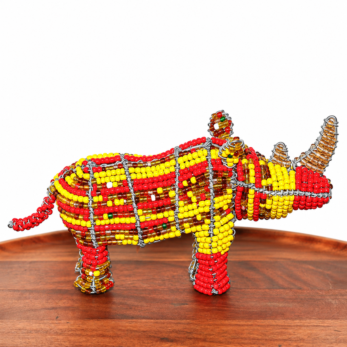 Tiny beaded wire rhino sculpture handmade by South African artists with colorful beadwork and detailed wire construction