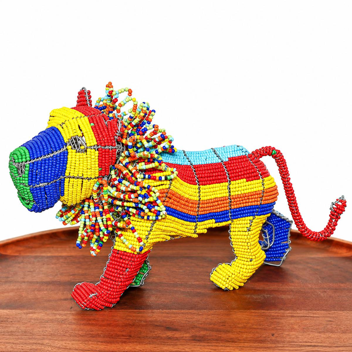 Colorful beaded wire lion sculpture handmade by South African artists with vibrant beadwork and detailed wire construction