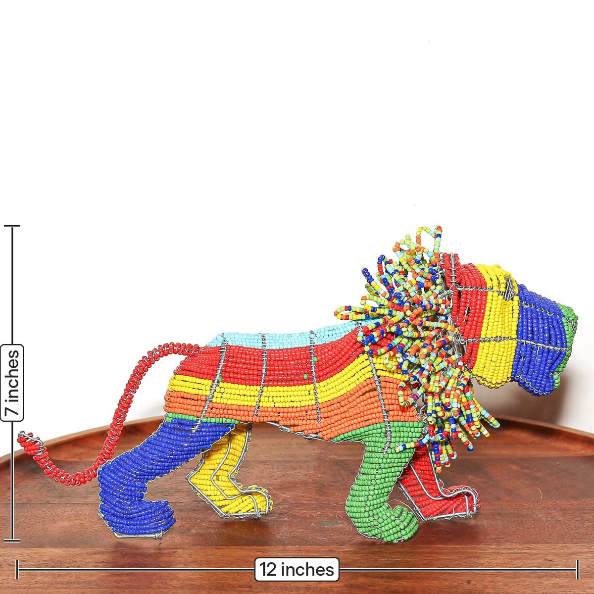 Beaded lion figurine handmade in South Africa with multicolored beads wrapped around a detailed sculptural wire frame