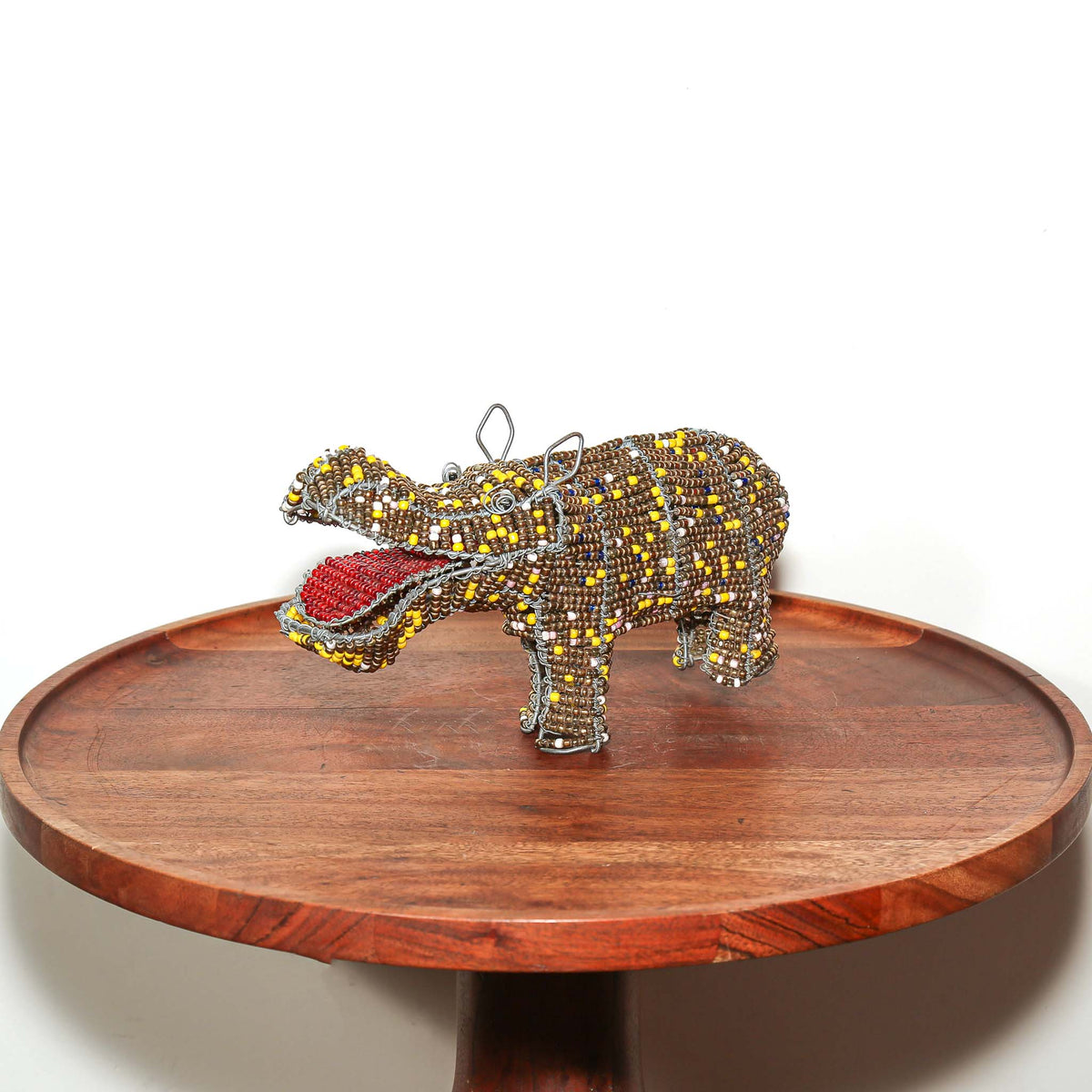 Small South African hippopotamus figurine crafted by hand from wire and vibrant decorative beads