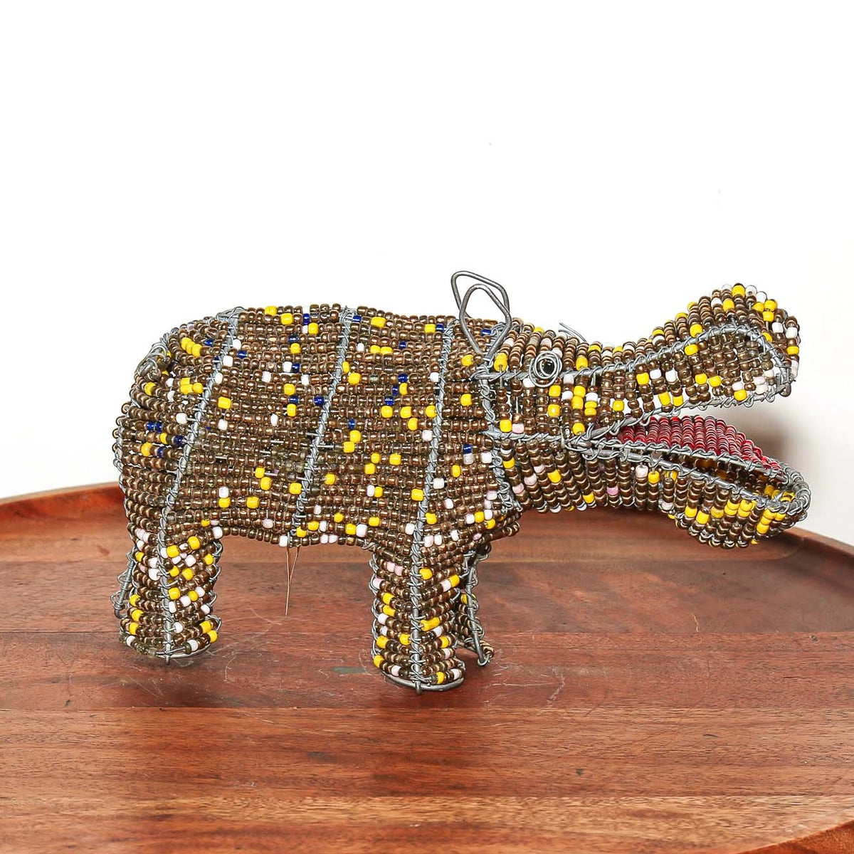 South African wire and bead hippopotamus sculpture with bright colors and a playful handcrafted design