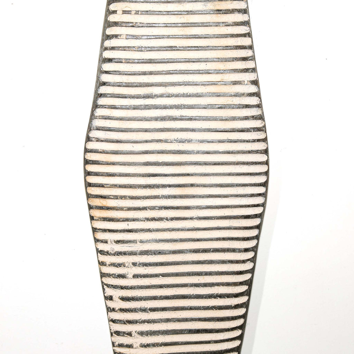 Large decorative Cameroon shield with black and white patterns, displayed as a distinctive piece of African wall art