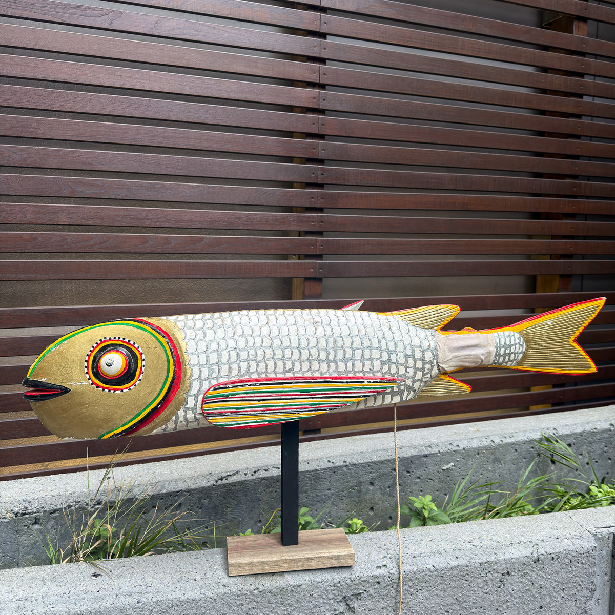 White fish sculpture puppet with an elongated body, detailed fins, and a bold sculptural silhouette for wall or tabletop display