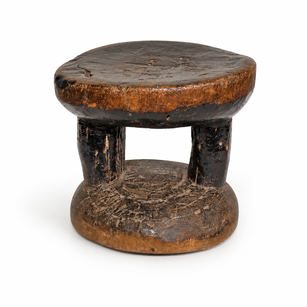 small round hand made wooden African table stool to be used as a small seat or table in a home decor