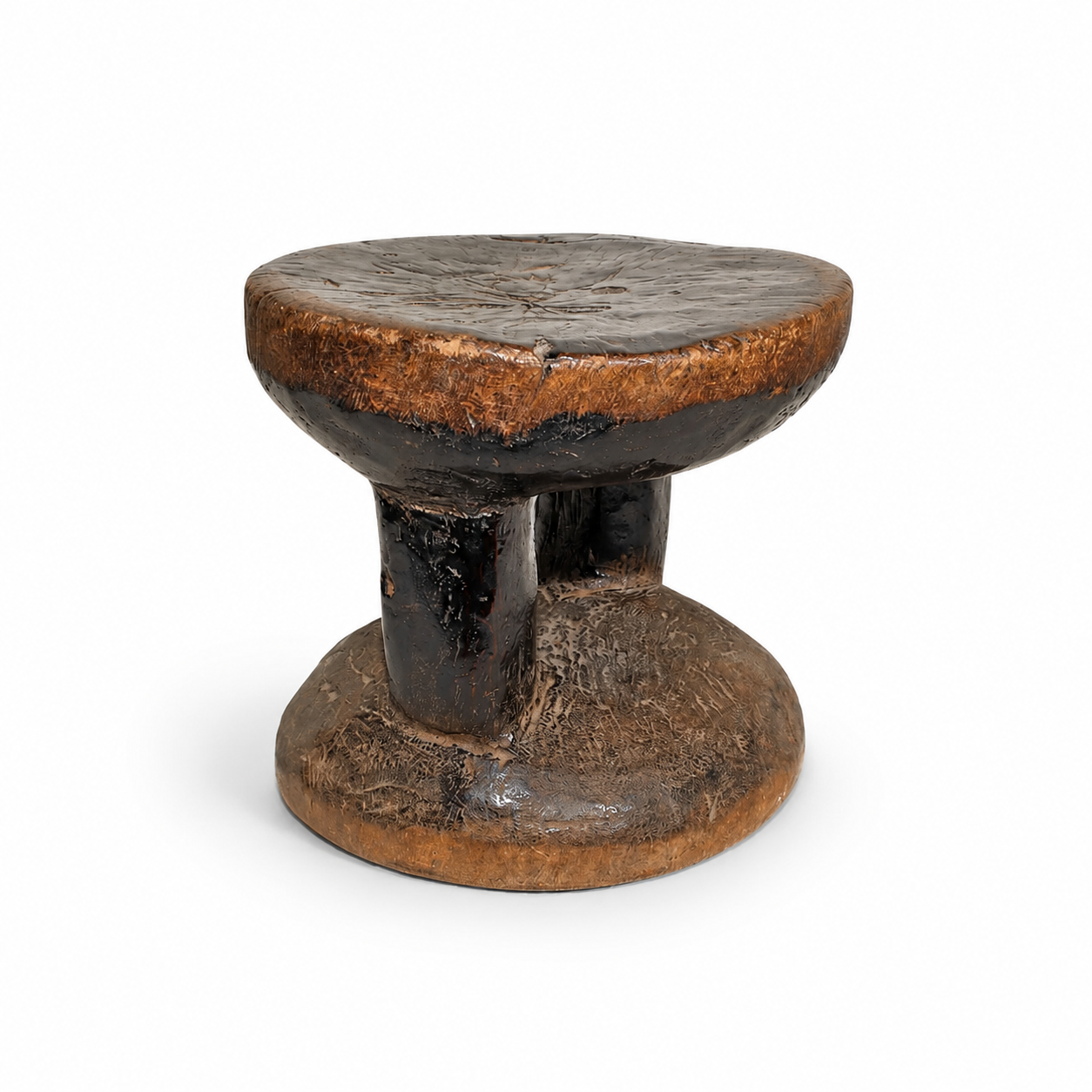 small round hand made wooden African table stool to be used as a small seat or table in a home decor