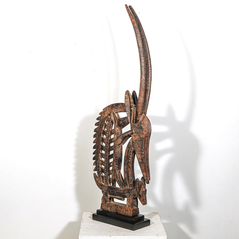 Antique African art, African home decor, African design pieces, African art for sale, Traditional African art, African-inspired home decor, Tribal art for sale, Vintage African art, African art and craft, Handmade African decor, African textiles, African furniture, African pottery, African masks, African sculptures
