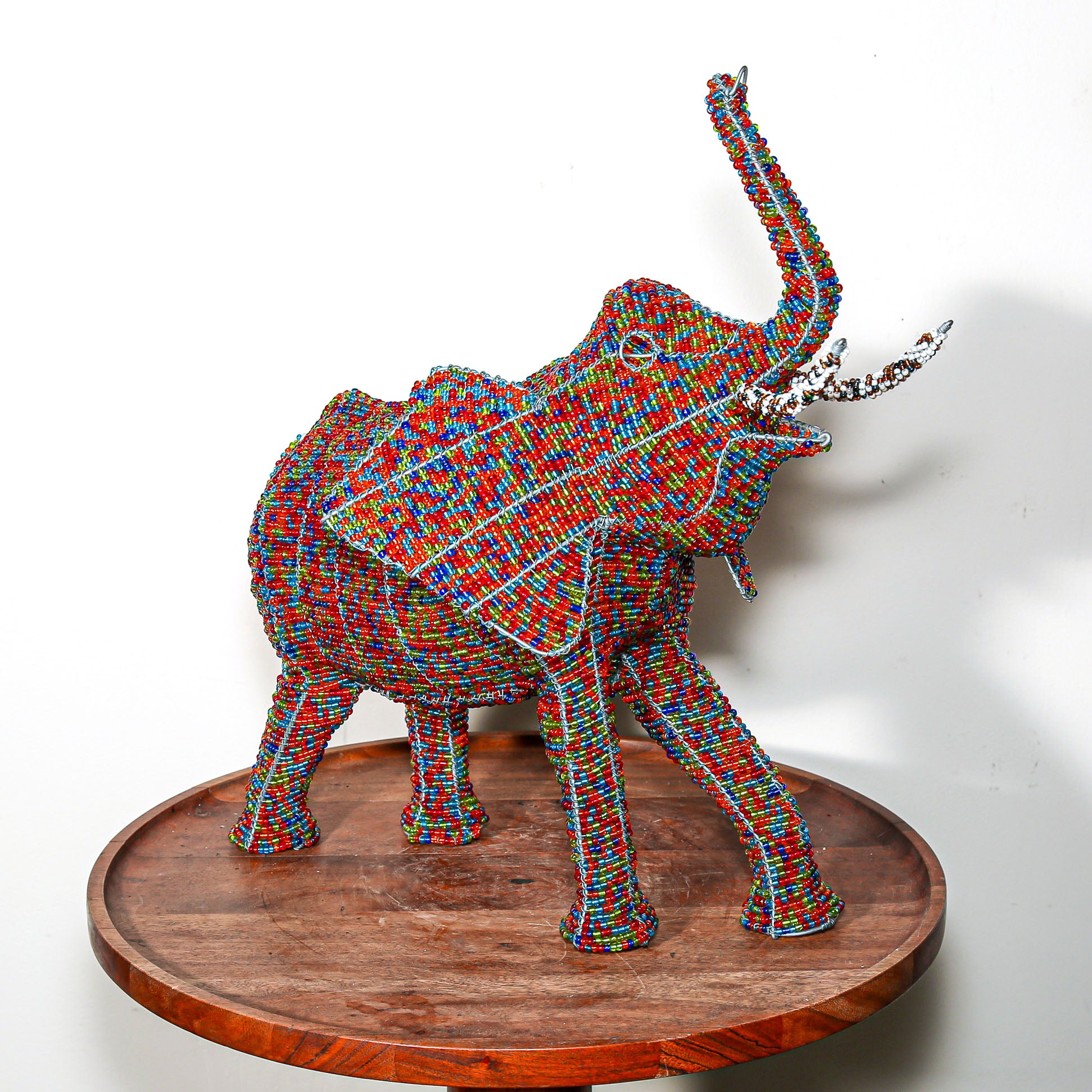 elephant made from multi colored beads