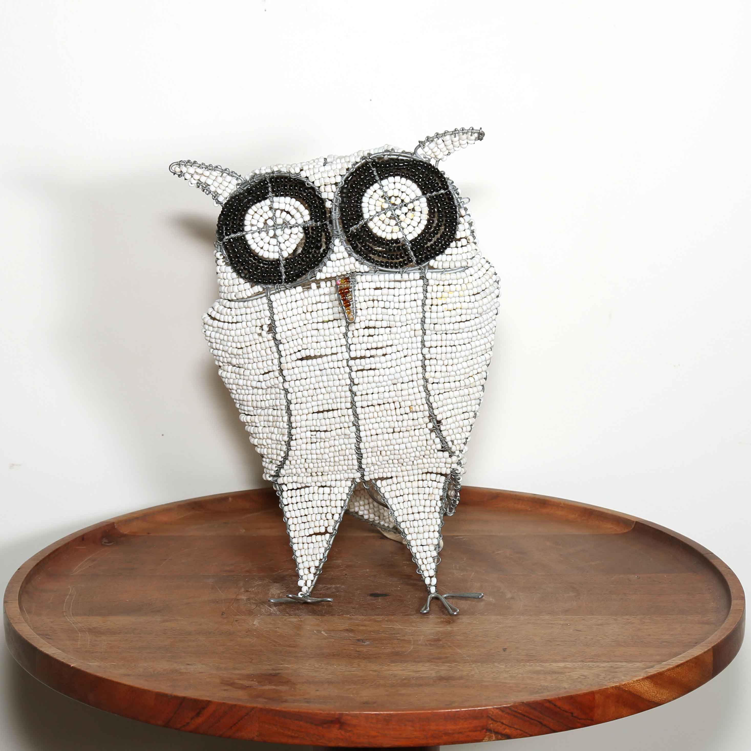 little white owl sculpture from Africa made from glass beads