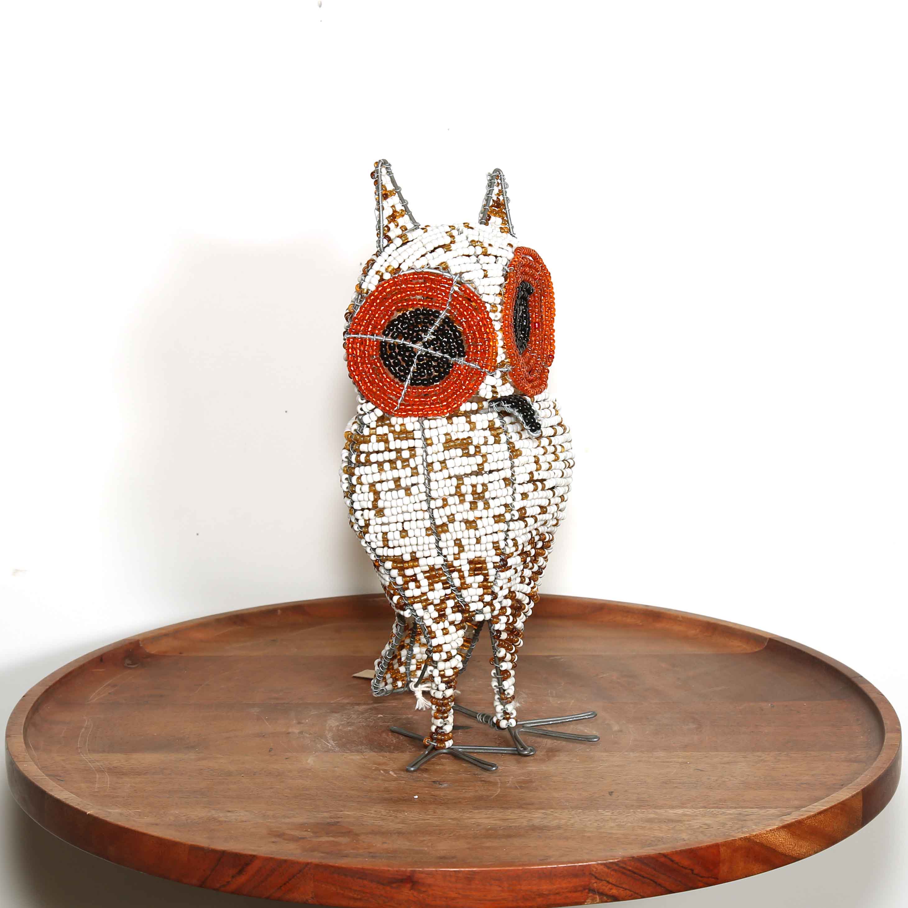 red and white African owl artwork hand made from beads and wire