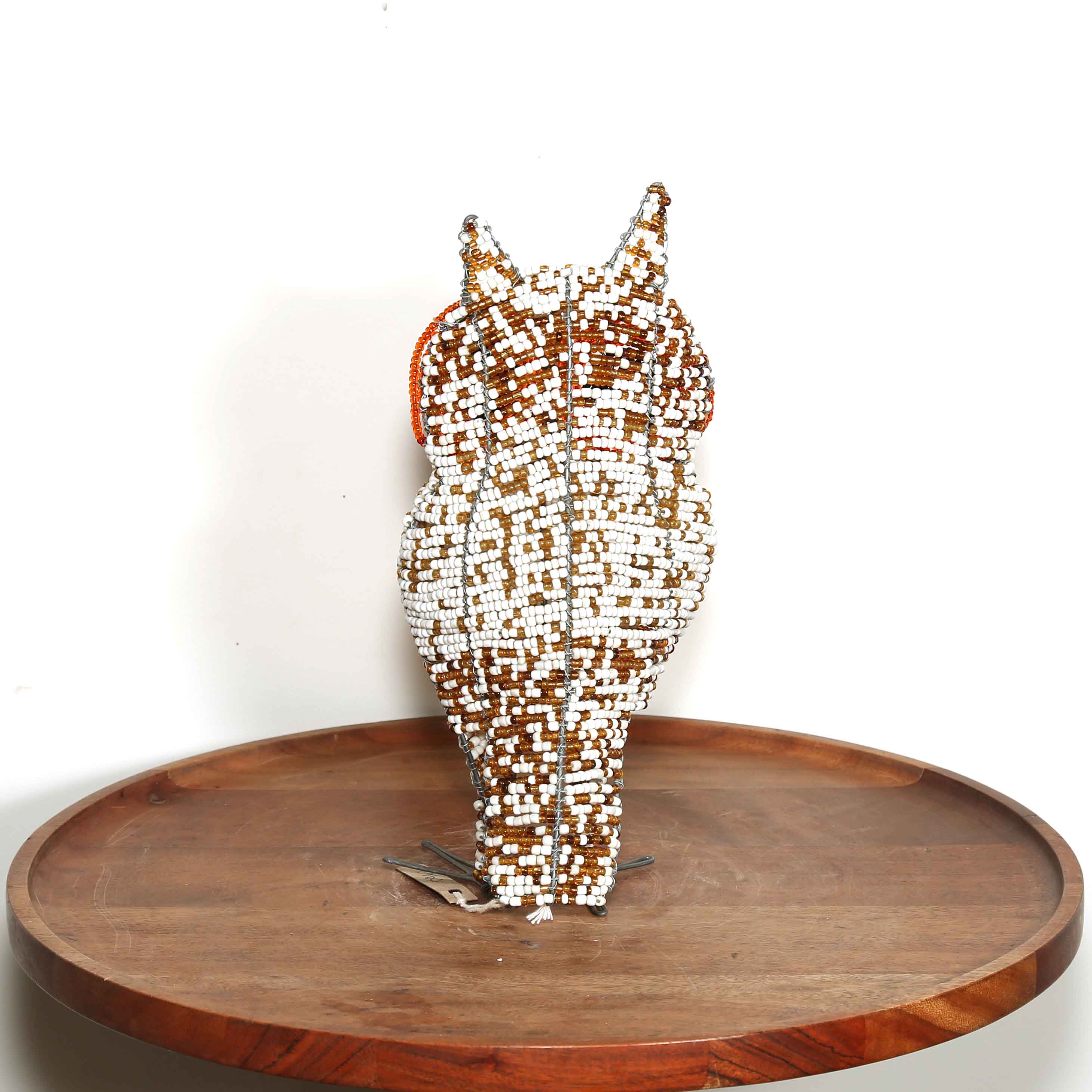red and white African owl artwork back view