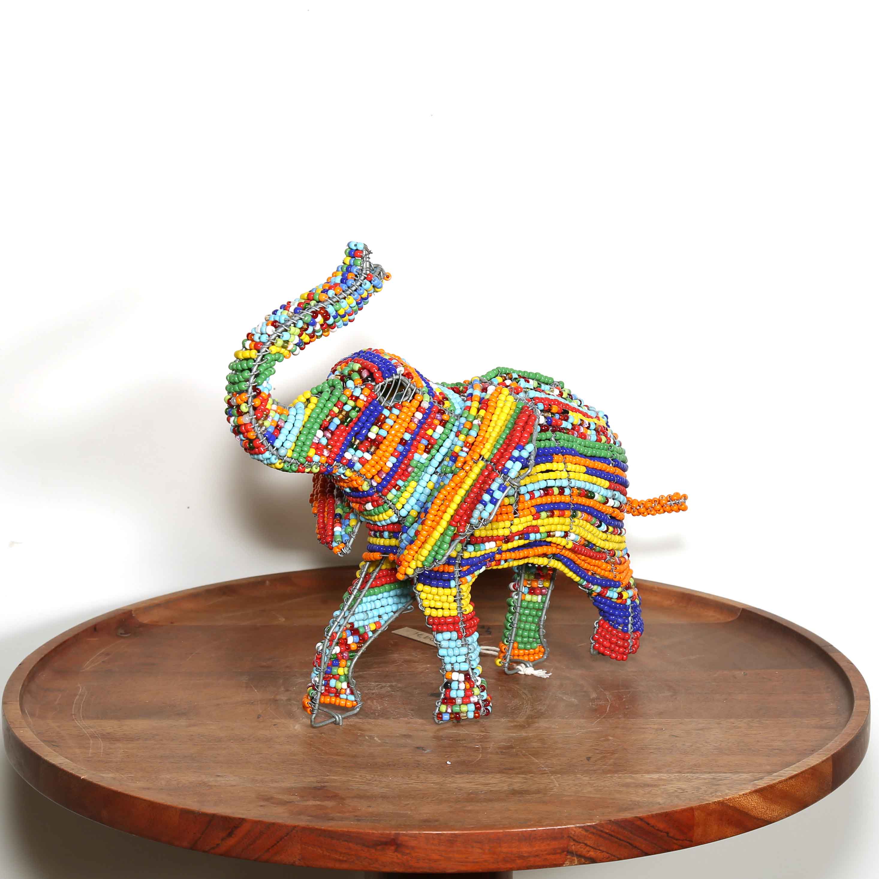 playful elephant art from Africa made from brightly colored beads