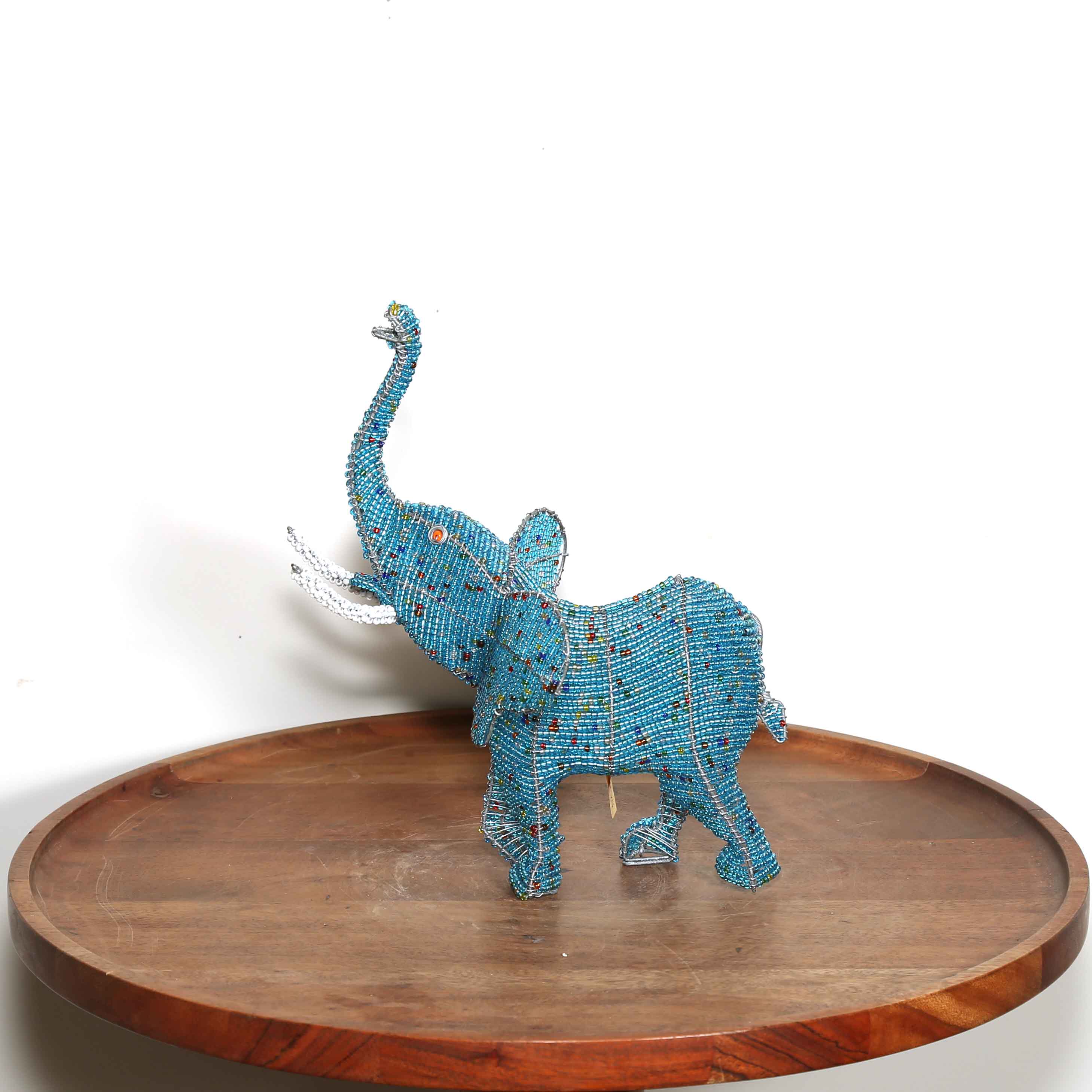 Small blue hand beaded elephant sculpture from Africa