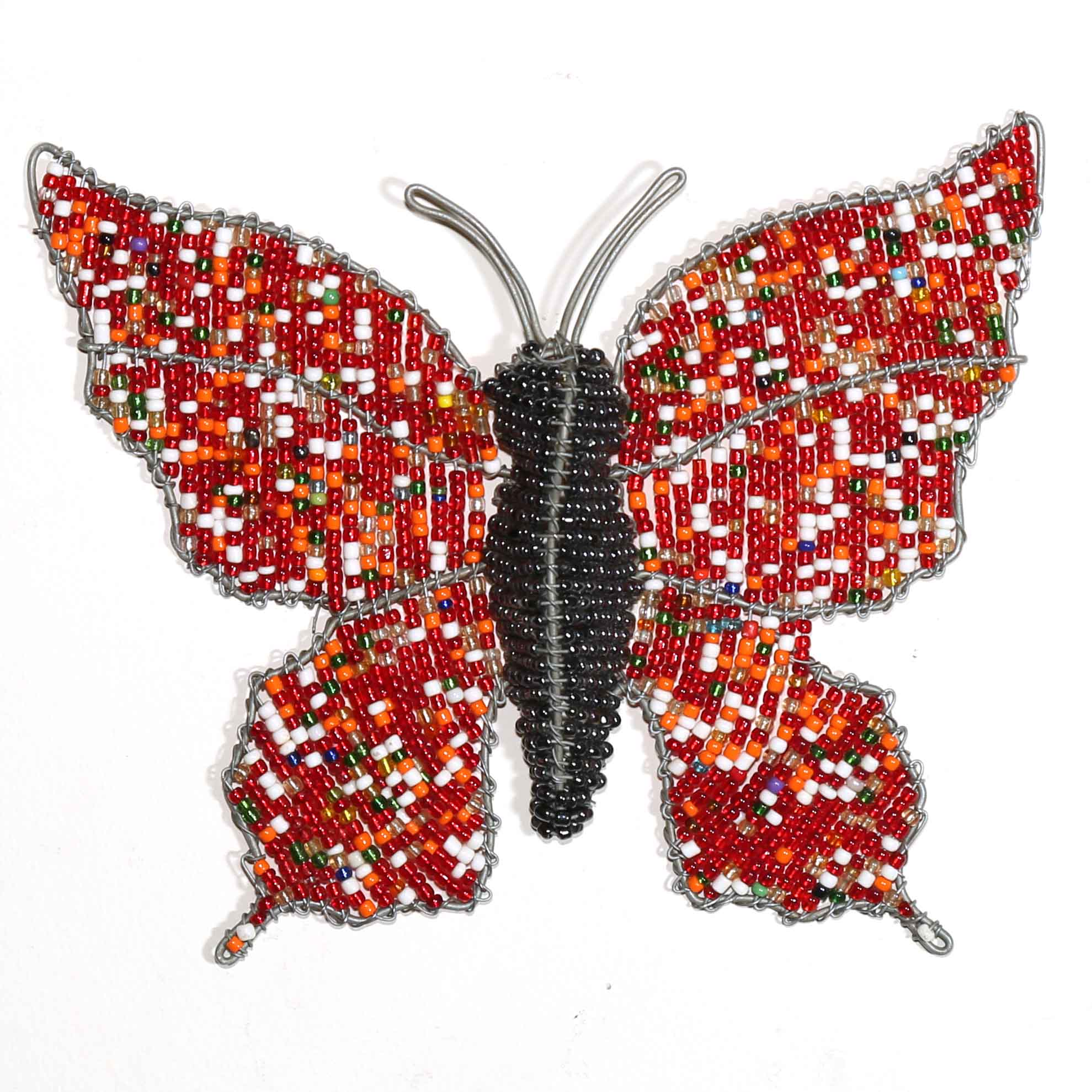 Beaded butterfly with red and orange pattern on a white background. African art of a butterfly