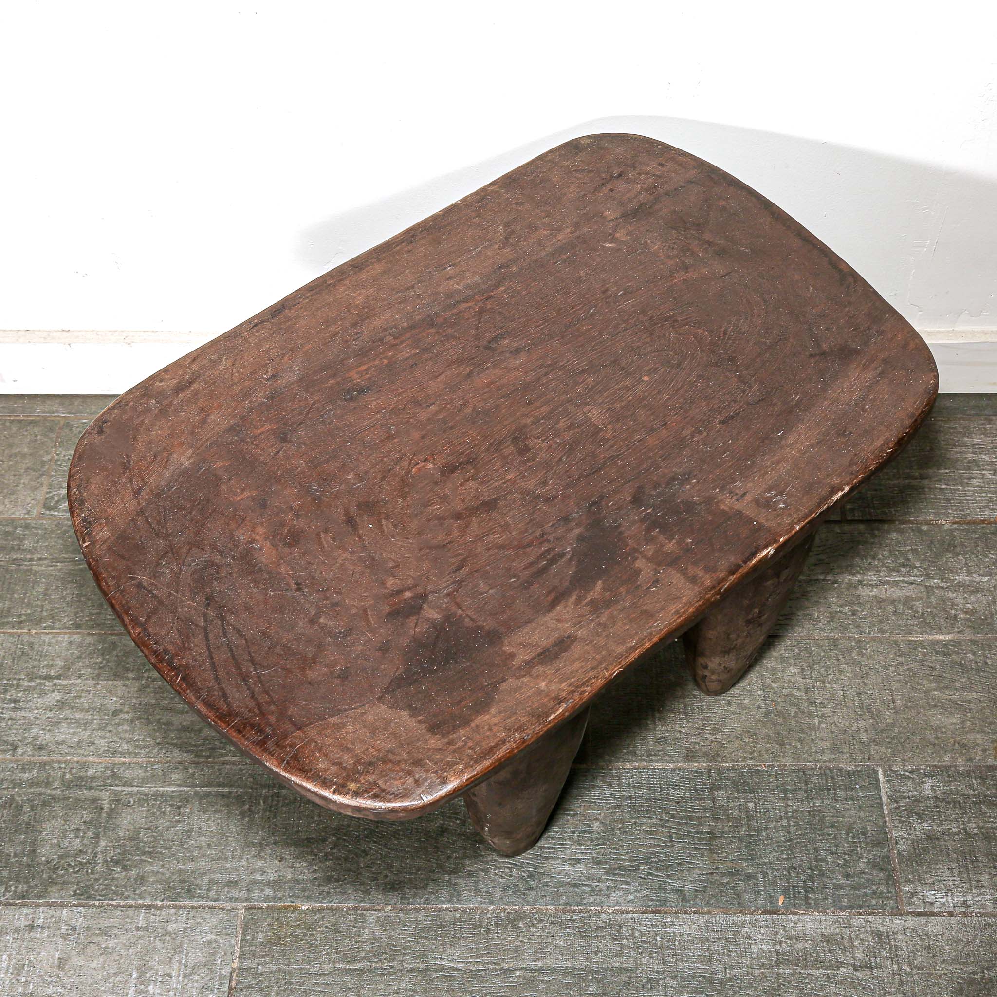 Wooden table with a natural, rustic finish from Africa with African style